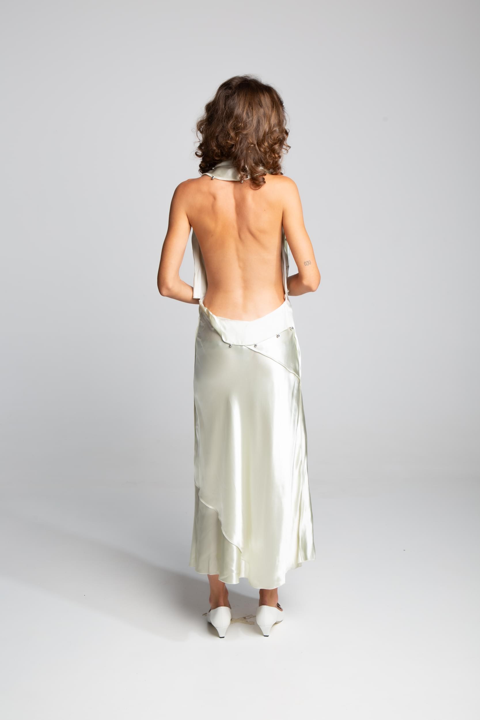 Bottega Veneta SS23 dress with embellished neckline and fluid bias-cut silhouette