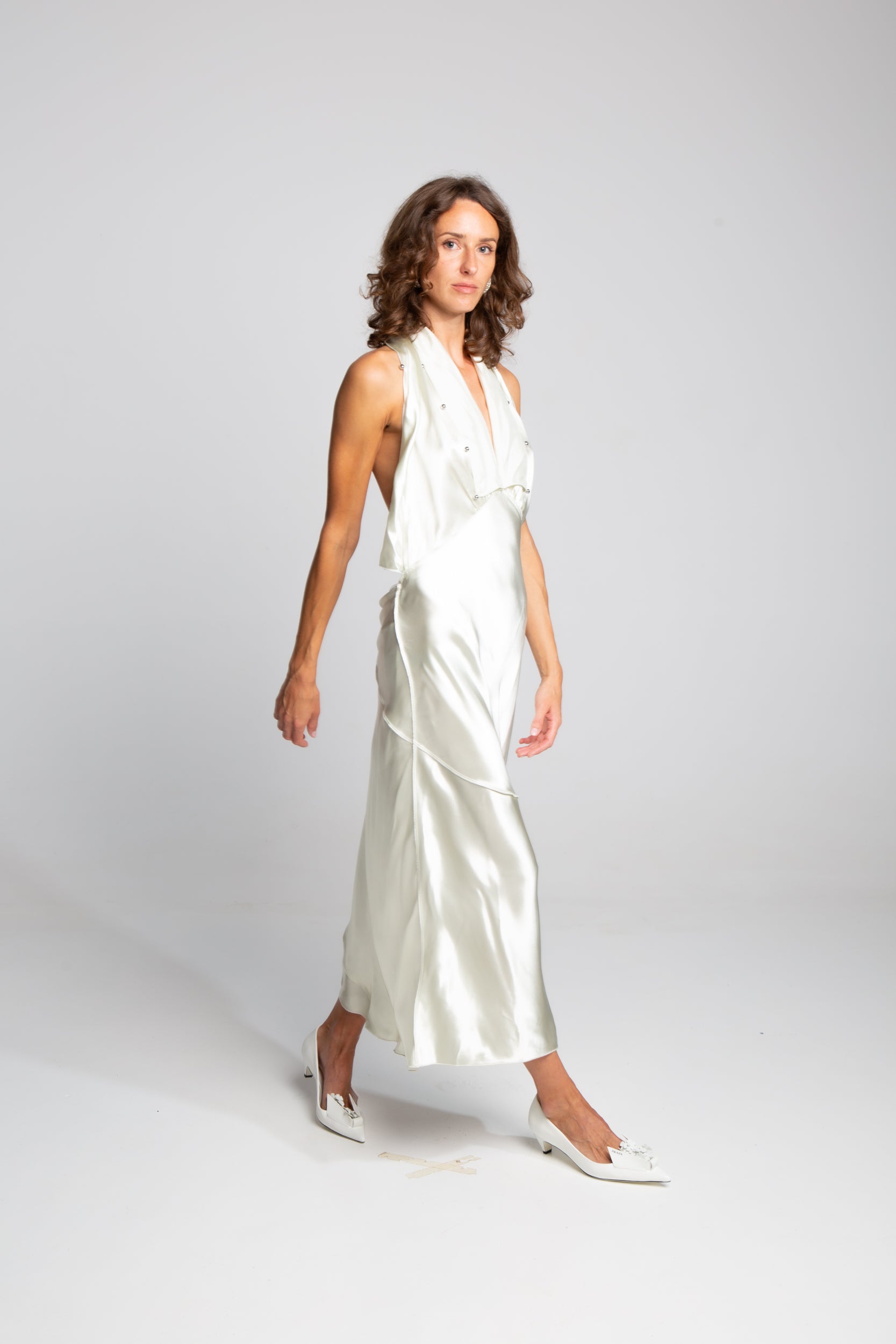 Designer satin halter dress with beaded detailing and soft draped movement