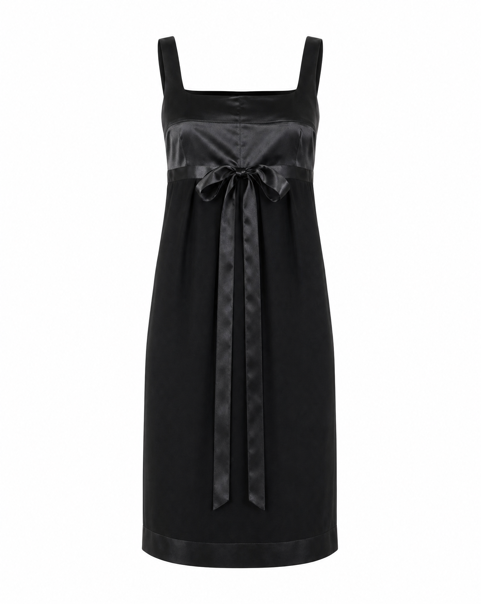A structured front view of the archival Chanel Little Black Dress, highlighting the sharp square neckline and the sophisticated silk-ribbon accent that defines the waistline.