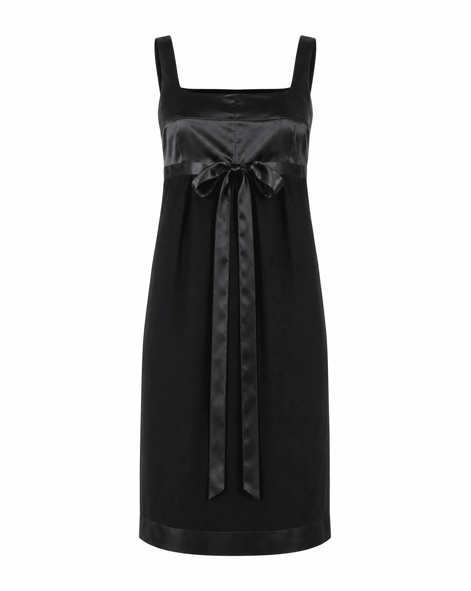 A structured front view of the archival Chanel Little Black Dress, highlighting the sharp square neckline and the sophisticated silk-ribbon accent that defines the waistline.
