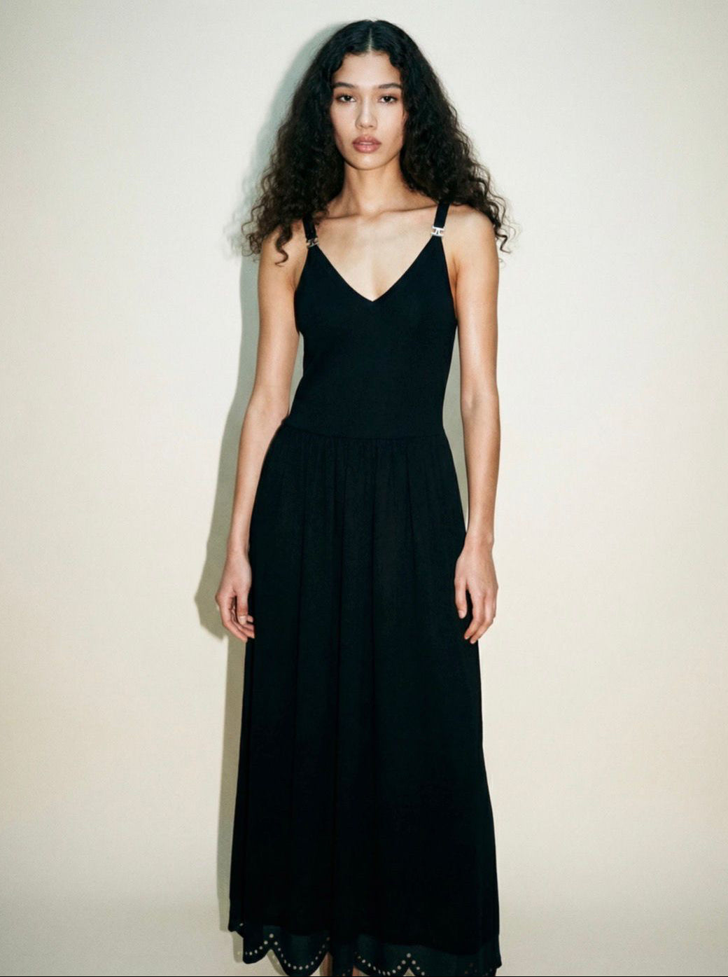 Chanel SS23 black maxi dress with CC logo straps and scalloped hem