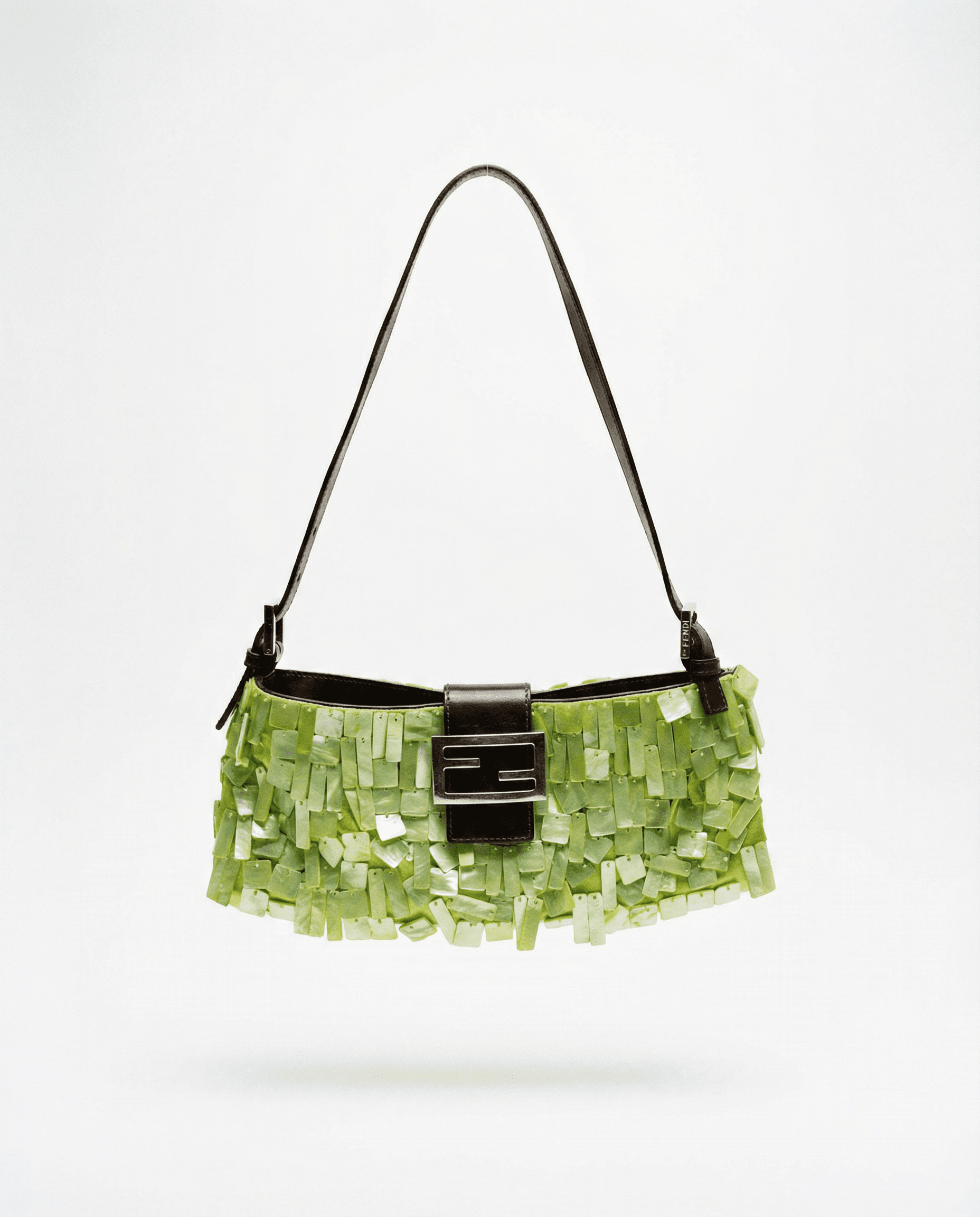 Archival Fendi Baguette bag from the early 2000s featuring iridescent green shell tile embellishment and signature silver FF buckle