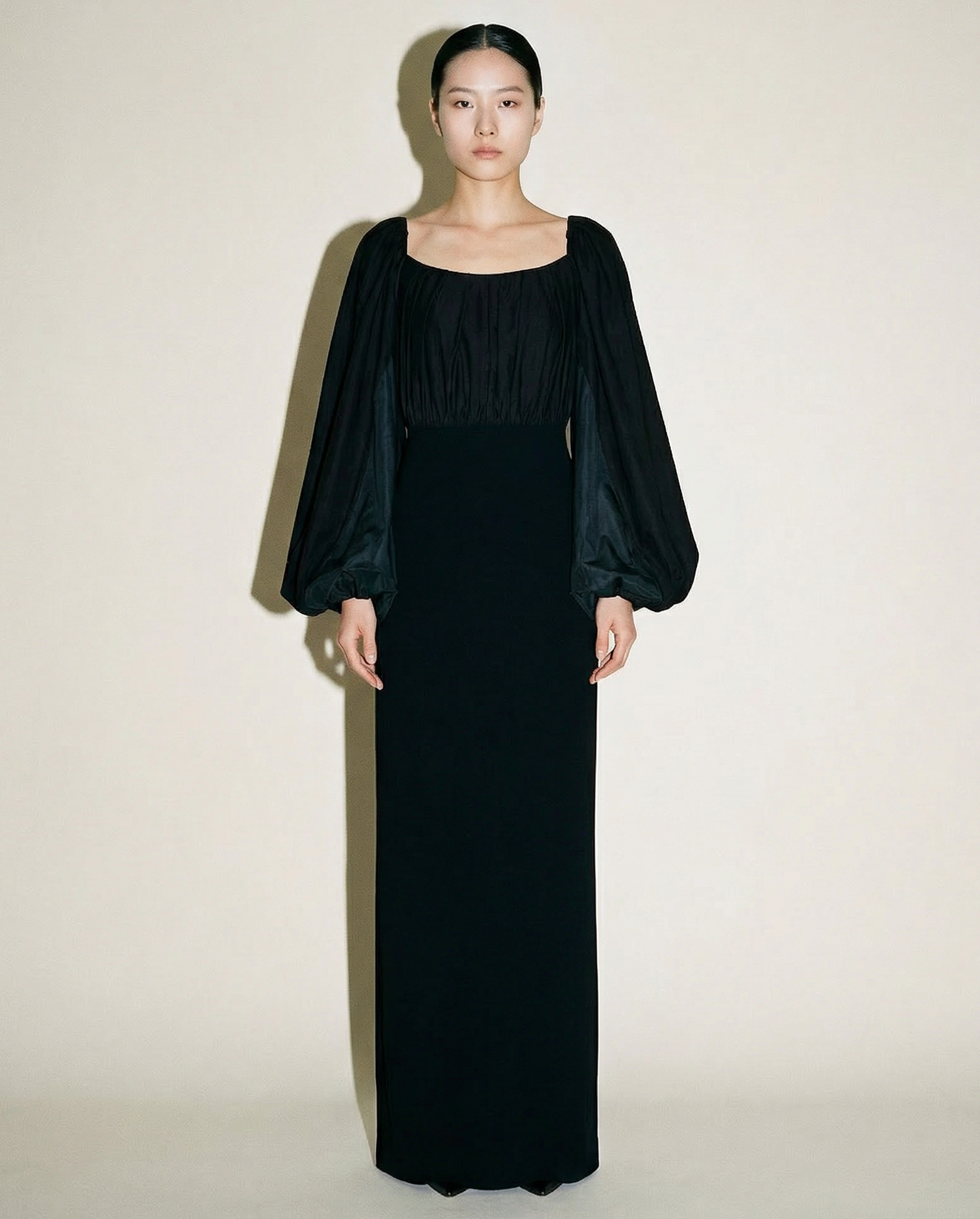 Solace London black off shoulder gown with voluminous balloon sleeves and floor length silhouette Mezzanotte Madrid