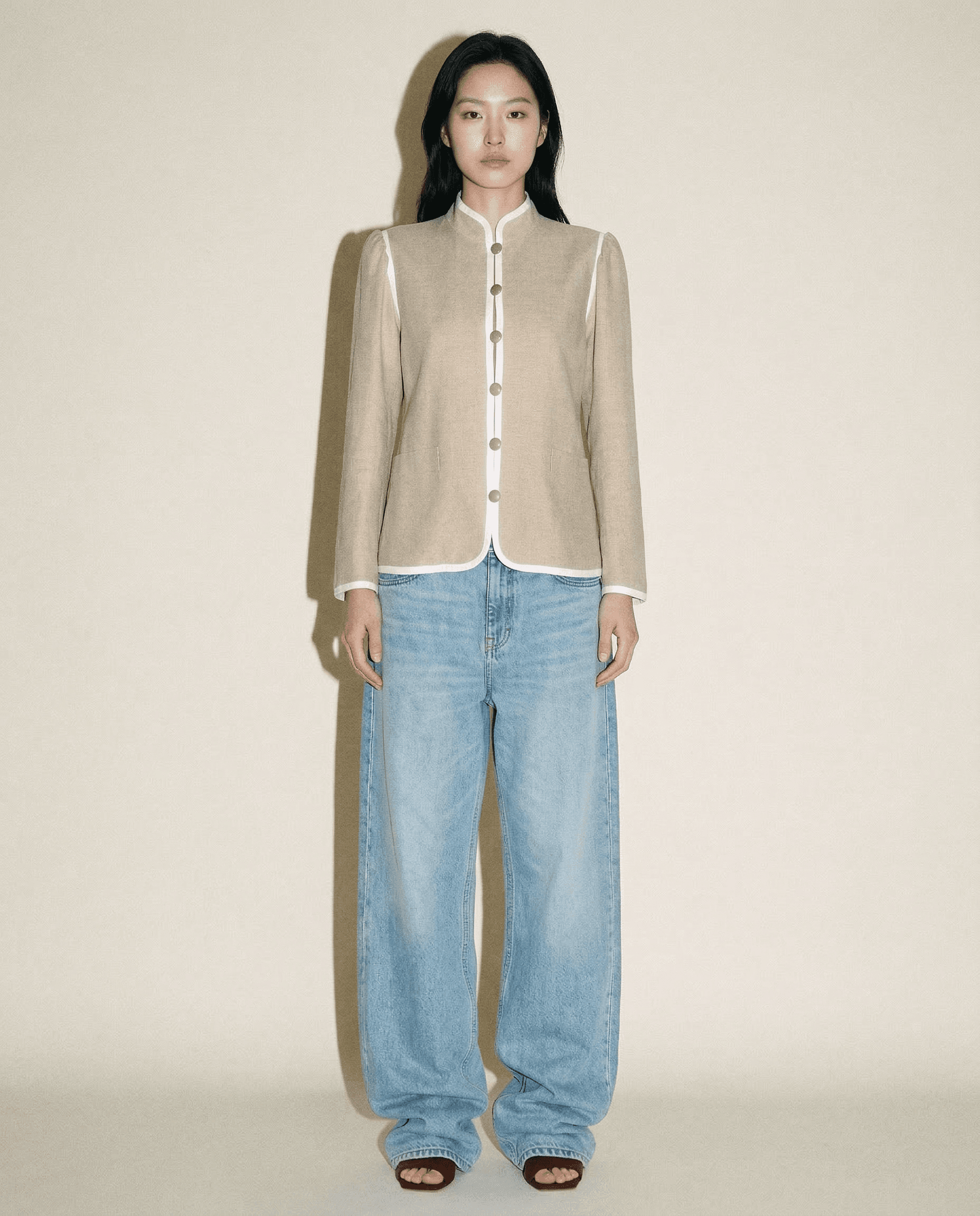 Yves Saint Laurent officer jacket in beige with mandarin collar and white braid trim Mezzanotte Madrid