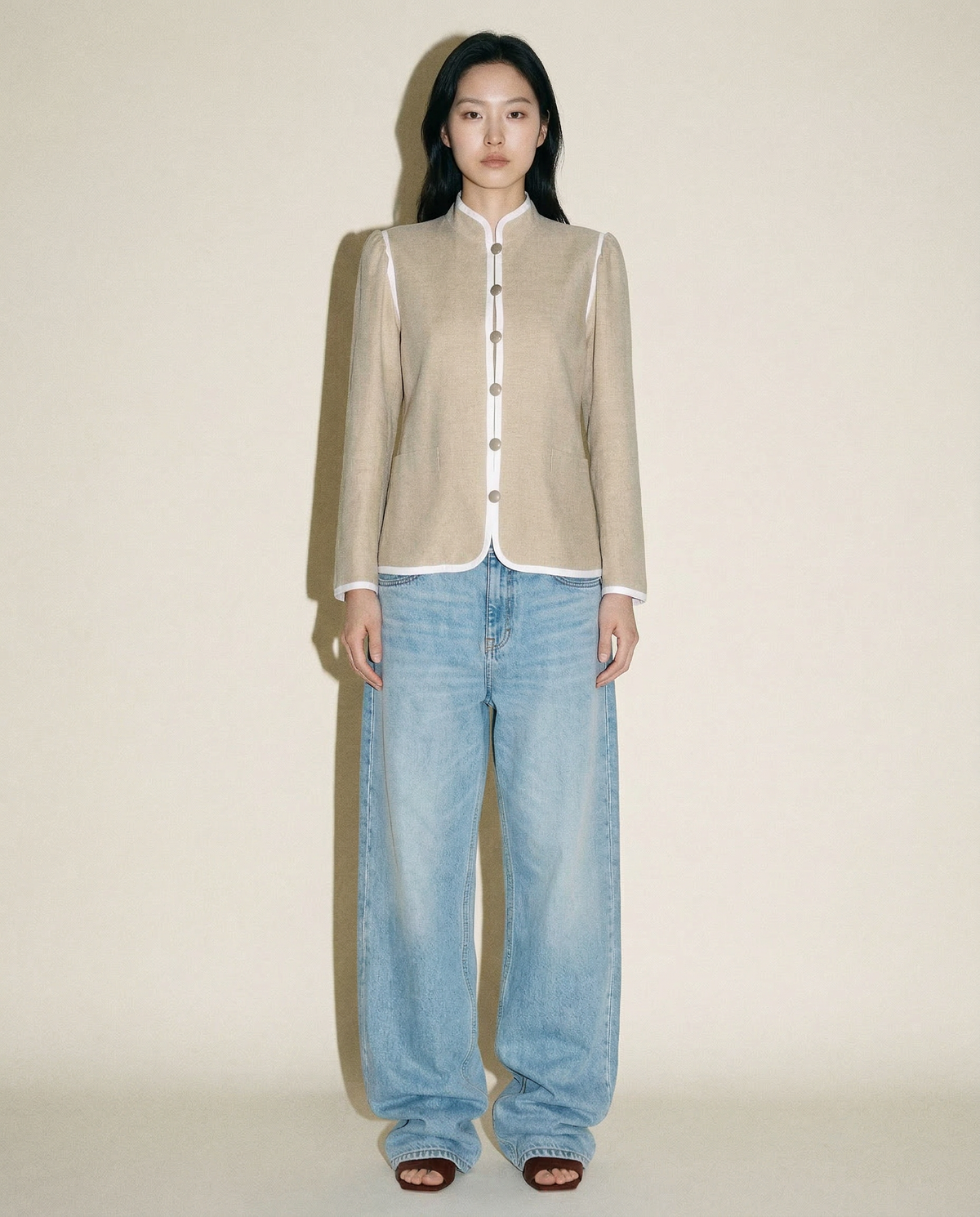 Yves Saint Laurent officer jacket in beige with mandarin collar and white braid trim Mezzanotte Madrid