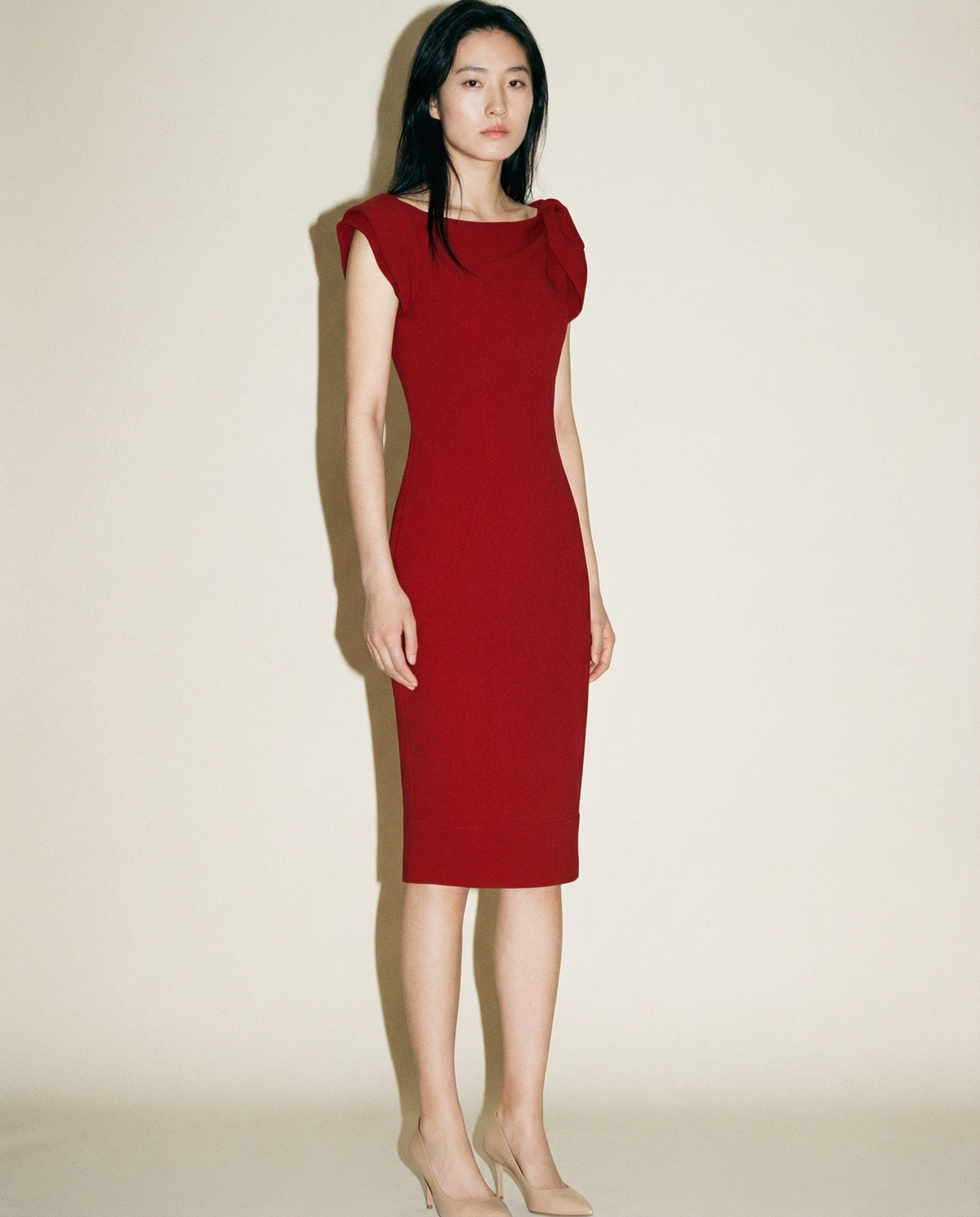 Prada red asymmetrical bow dress FW2012 with sculpted midi silhouette Mezzanotte Madrid