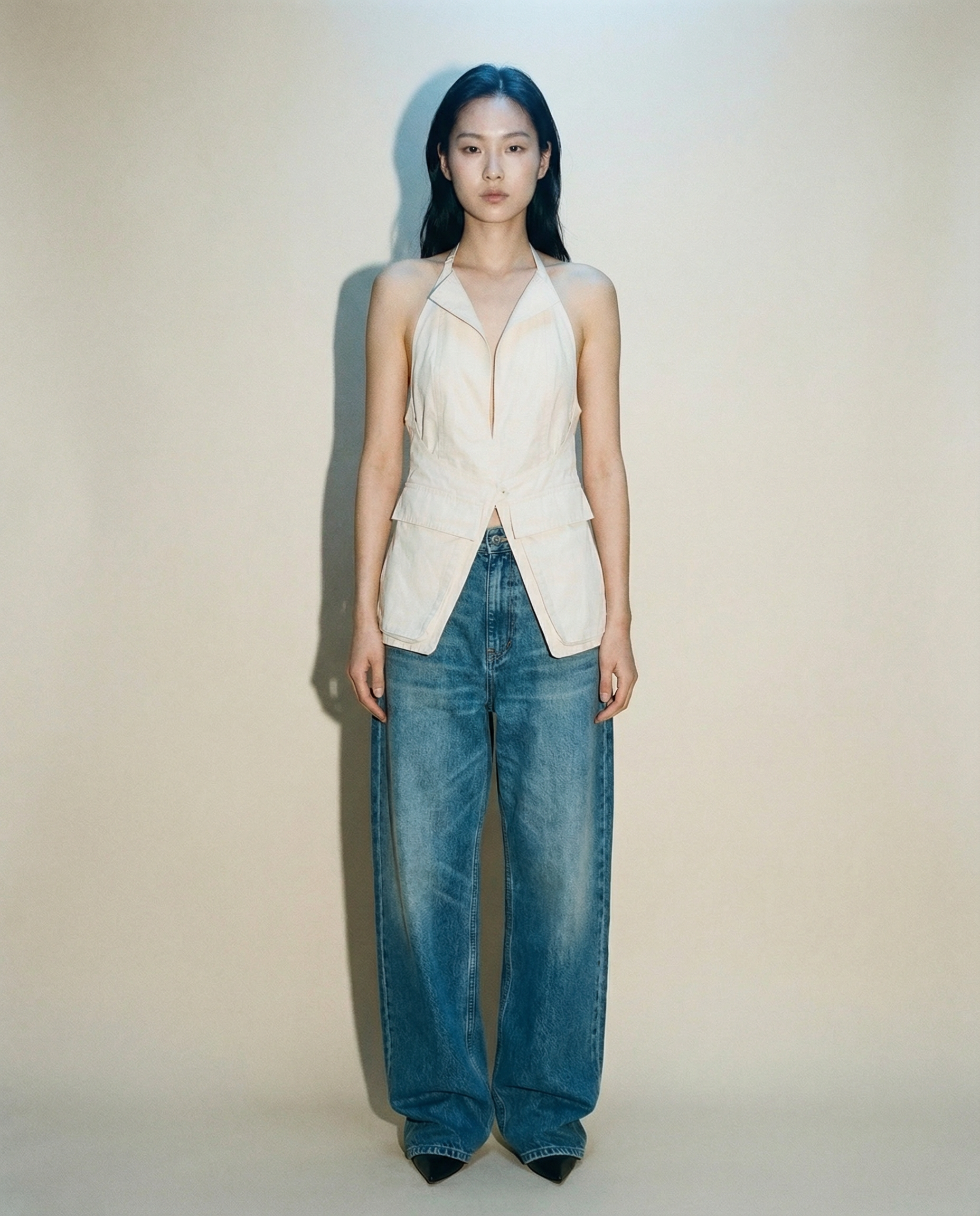 Jacquemus white halter top with blazer lapels and deep V neckline Mezzanotte Madrid