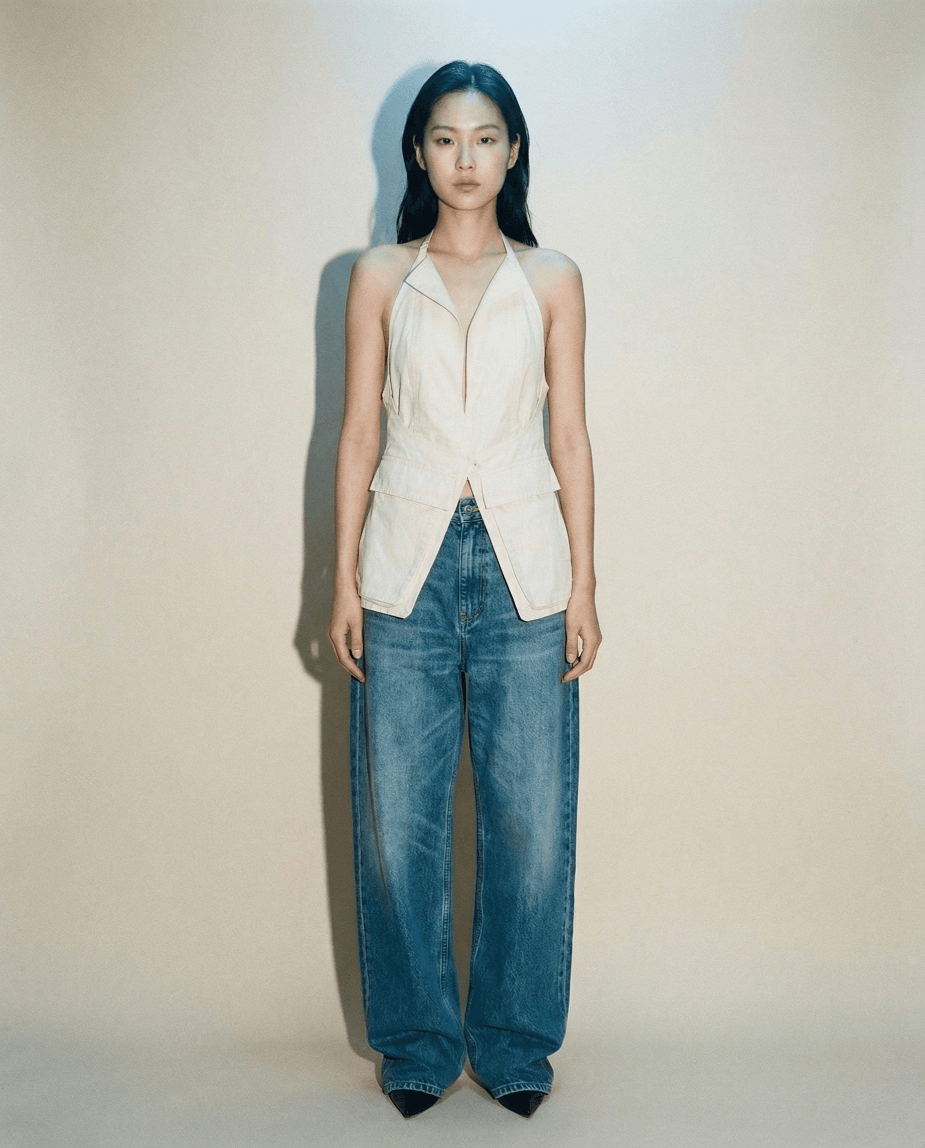 Jacquemus white halter top with blazer lapels and deep V neckline Mezzanotte Madrid