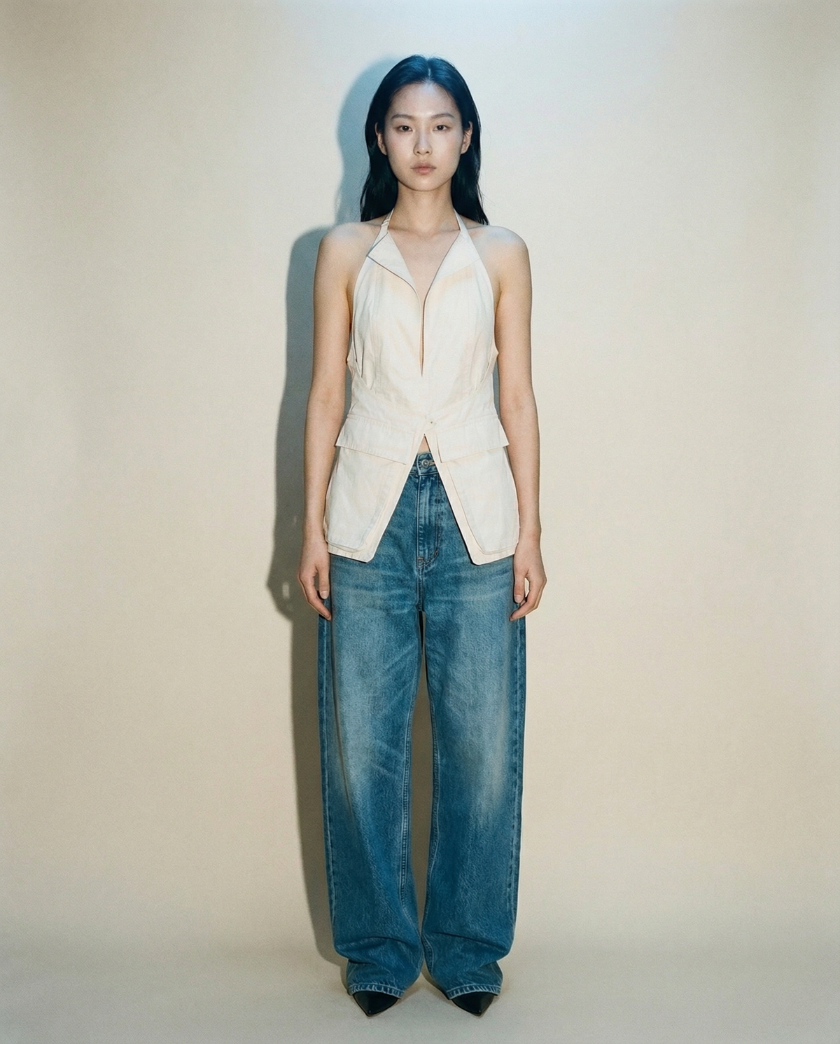 Jacquemus white halter top with blazer lapels and deep V neckline Mezzanotte Madrid