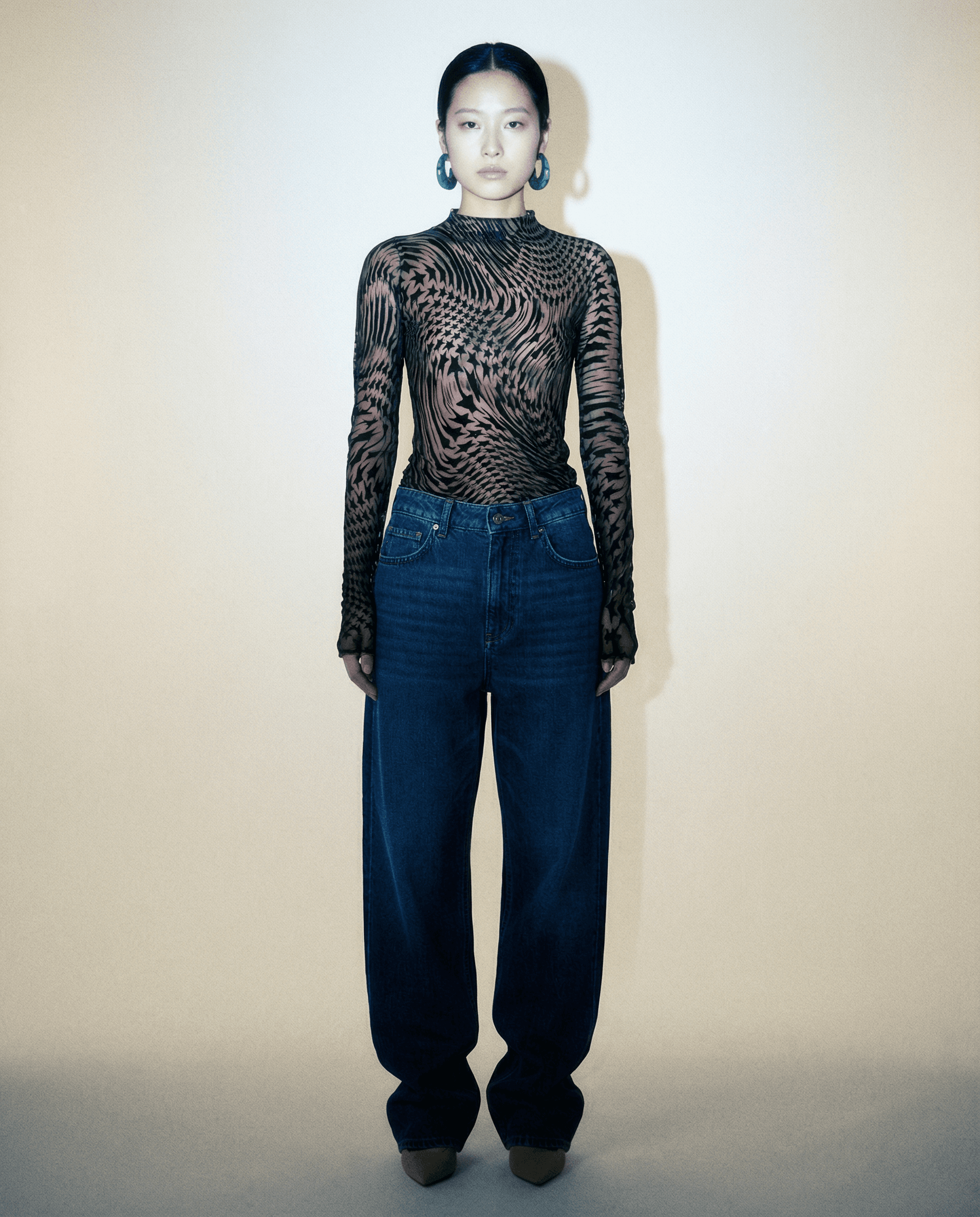 Mugler star print mesh top with high neck and sheer fabric Mezzanotte Madrid
