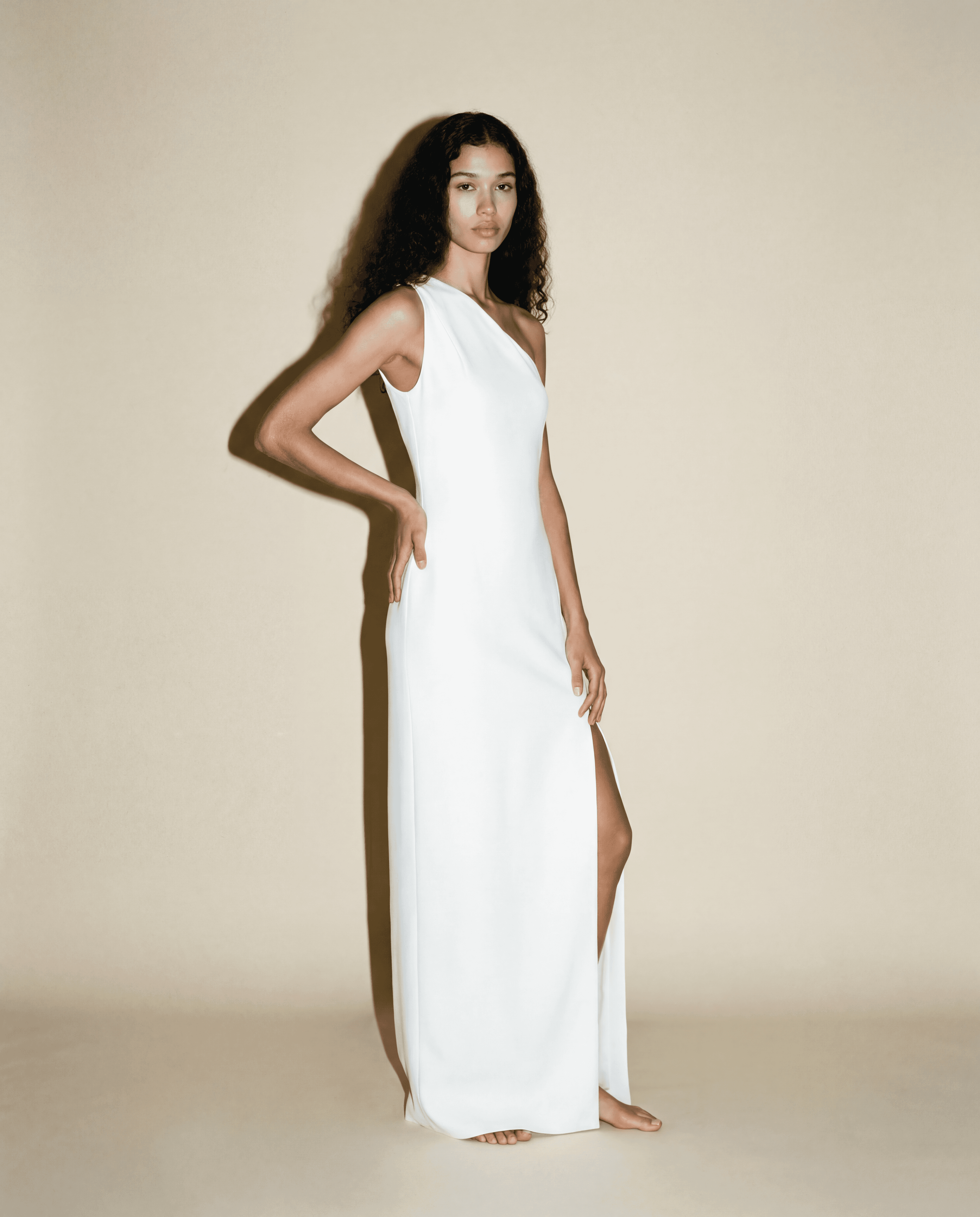 White One-Shoulder Column Dress with High Slit.