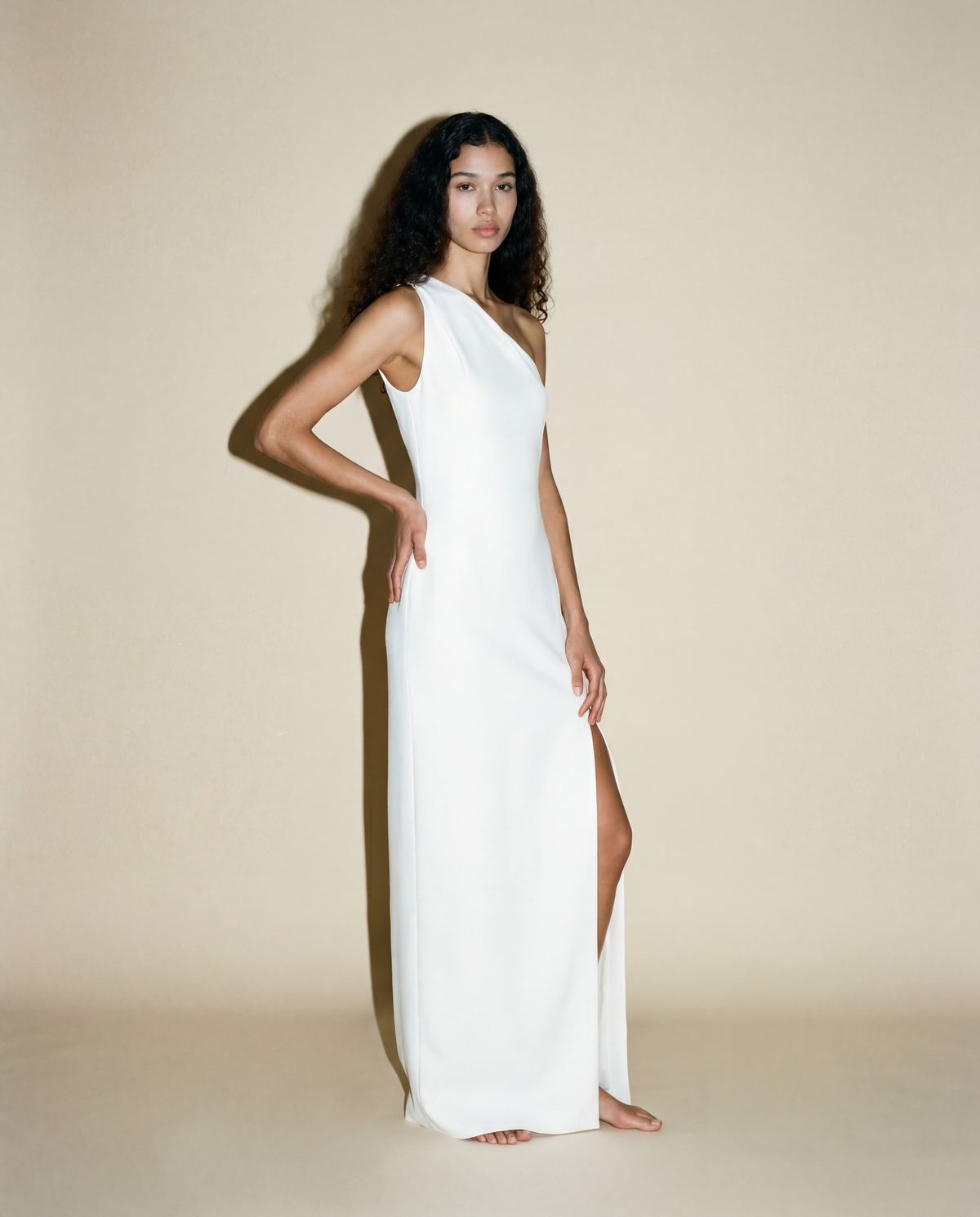 White One-Shoulder Column Dress with High Slit.