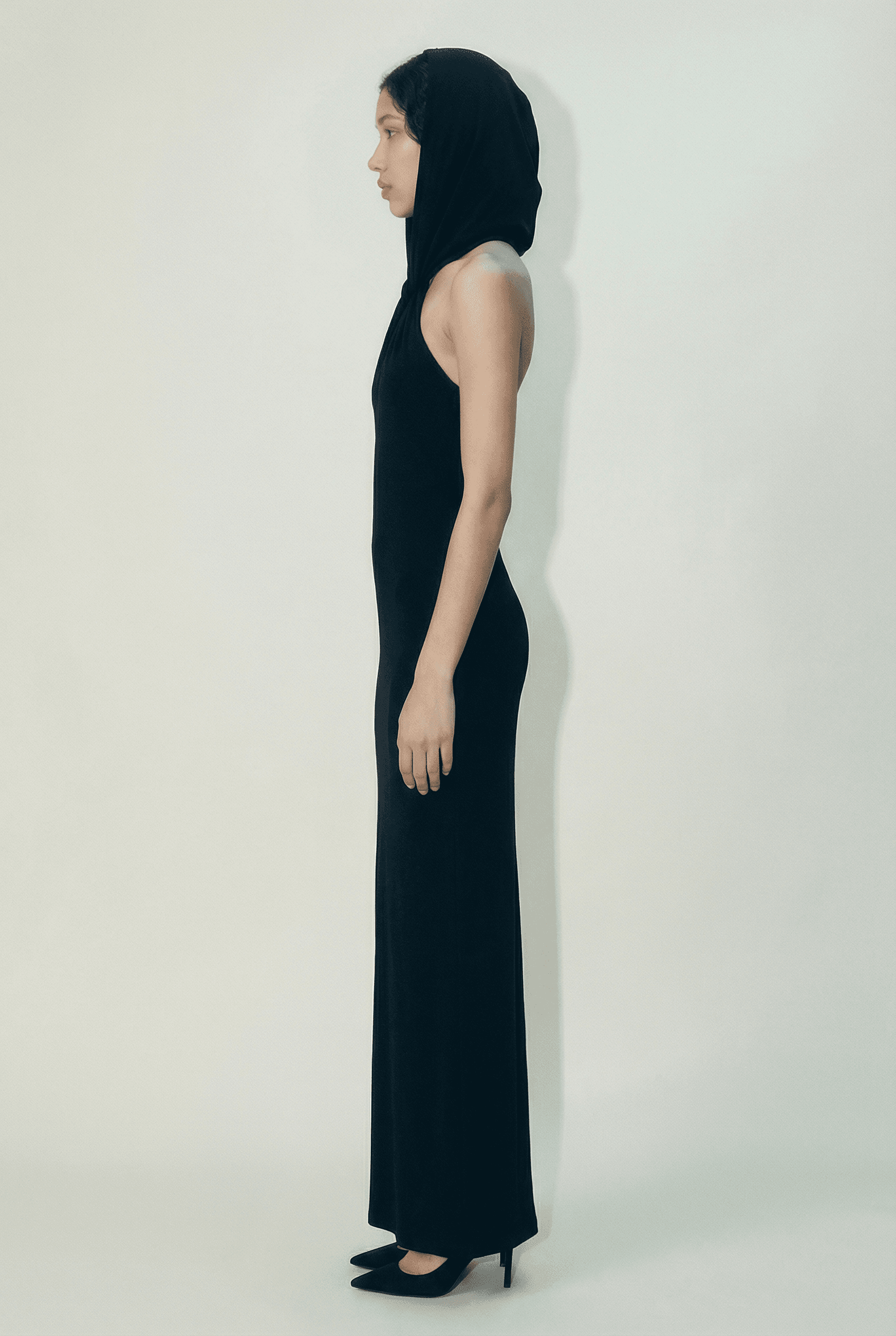 Hooded Open-Back Gown — Capuche Draped Silhouette.