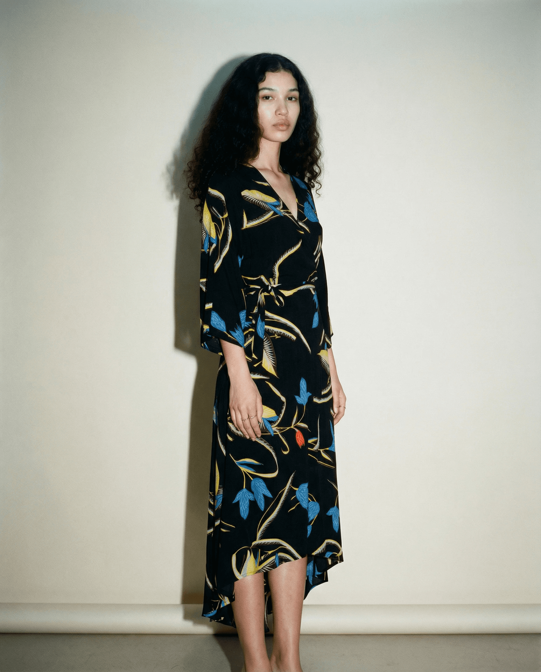 Black silk midi dress with blue and yellow floral pattern DVF