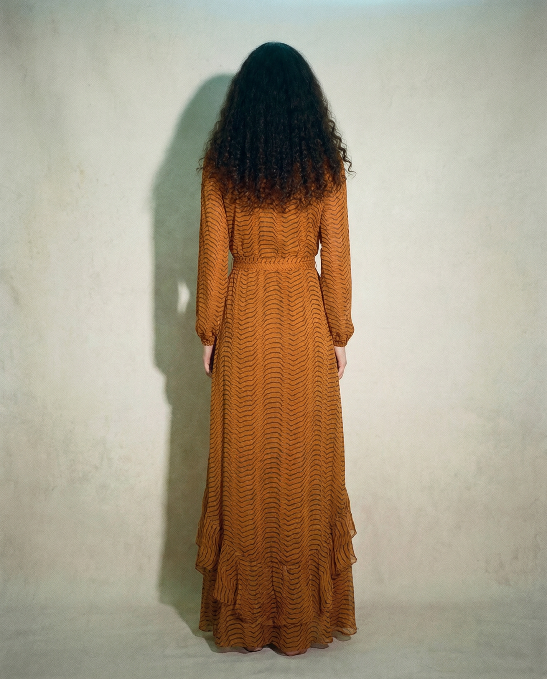 DVF tiger print dress with asymmetric ruffles and V neckline