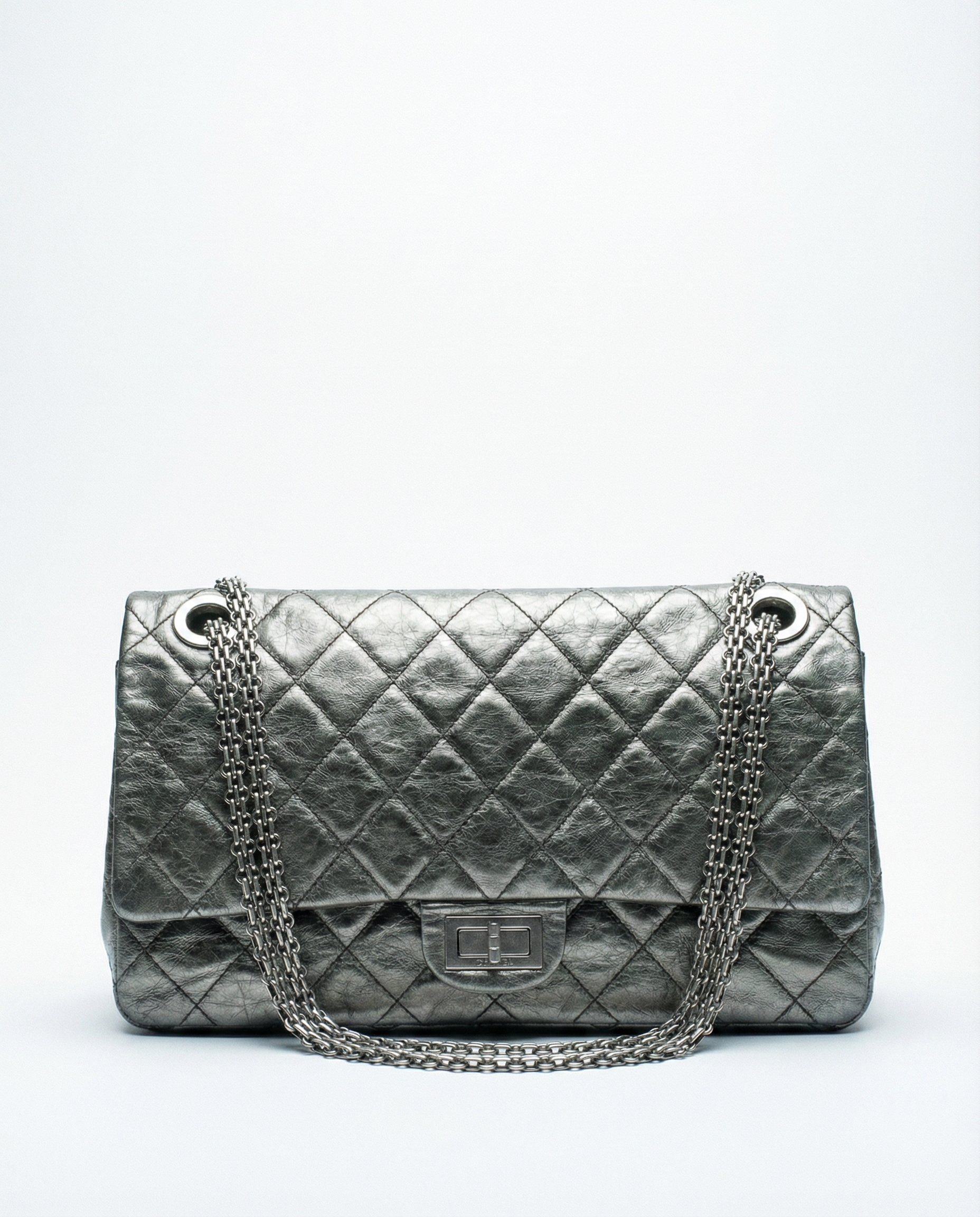 Quilted Chanel flap bag with Mademoiselle lock and metallic leather finish