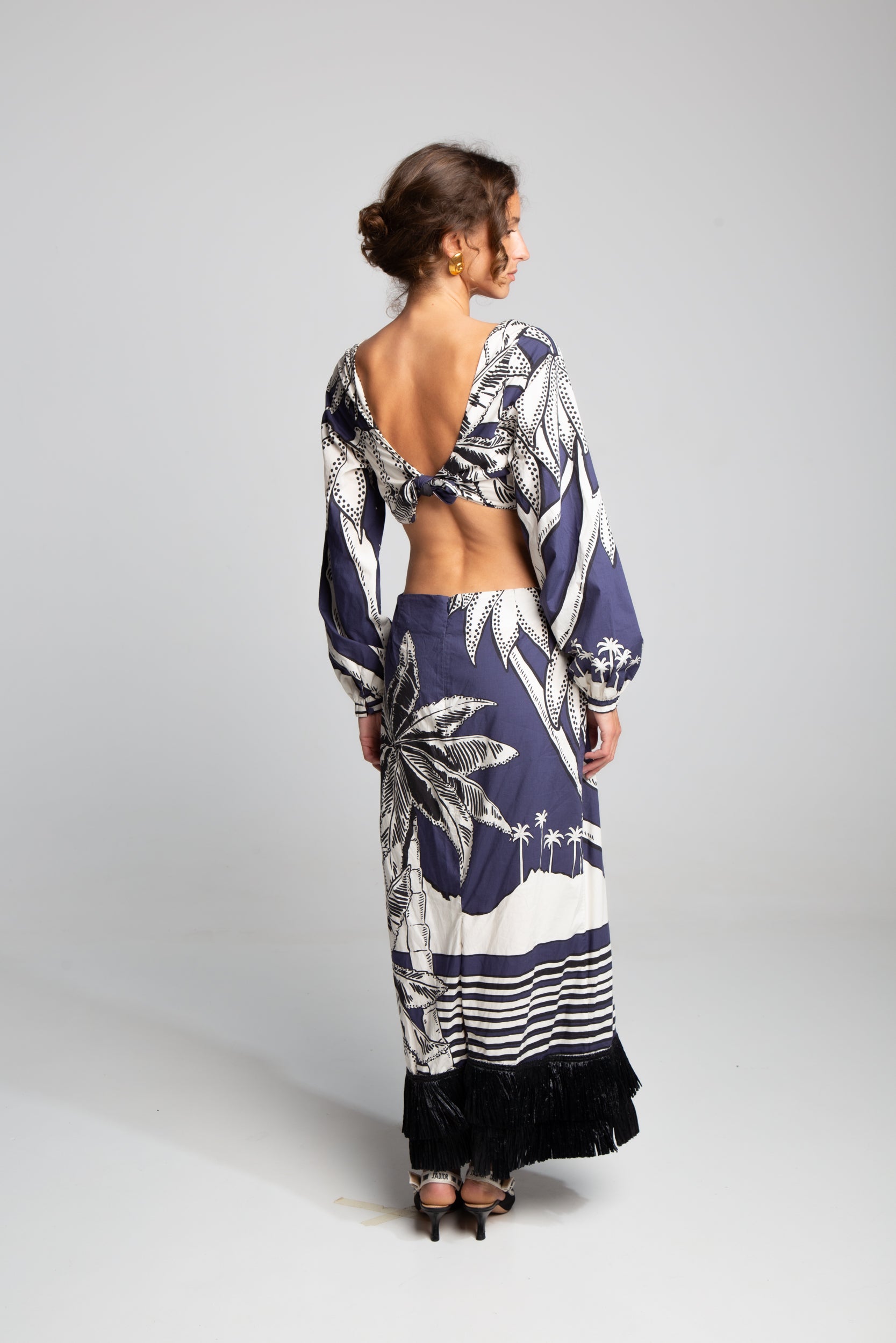 Johanna Ortiz long sleeve dress with graphic print and architectural cut-out design