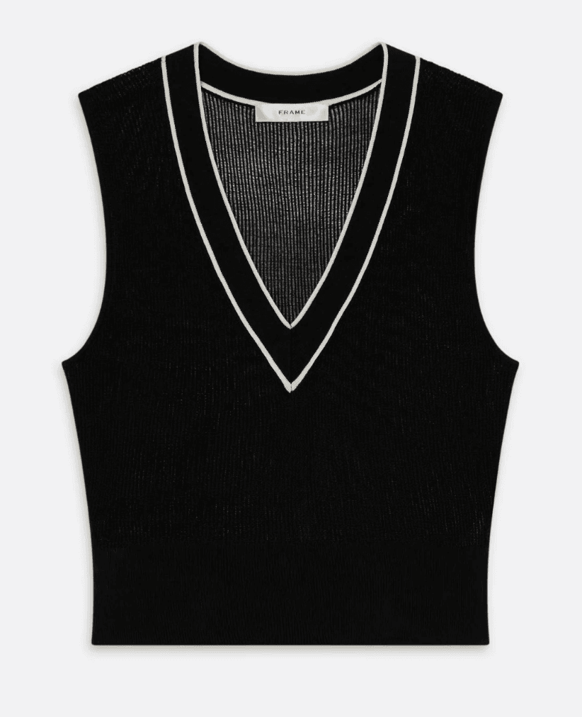 Black ribbed top with deep V neckline and minimalist fitted silhouette