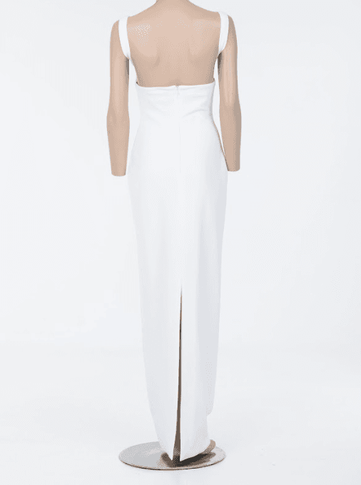 Minimalist white gown with wide straps and sculptural silhouette