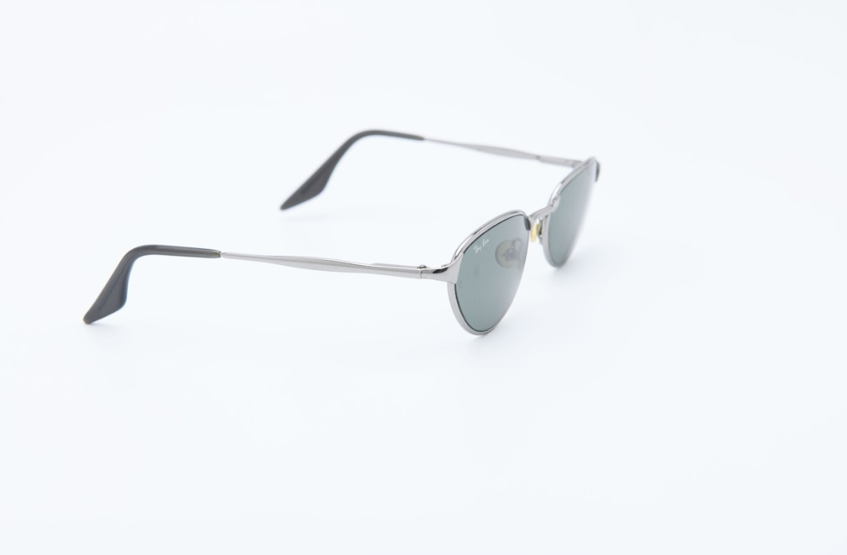 Silver metal oval sunglasses with green G15 lenses and BL etching | Ray-Ban 1990s eyewear