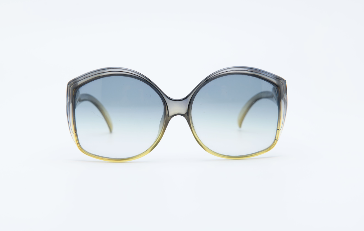 Vintage Dior 1970s sunglasses with large sculptural frame and tinted gradient lenses