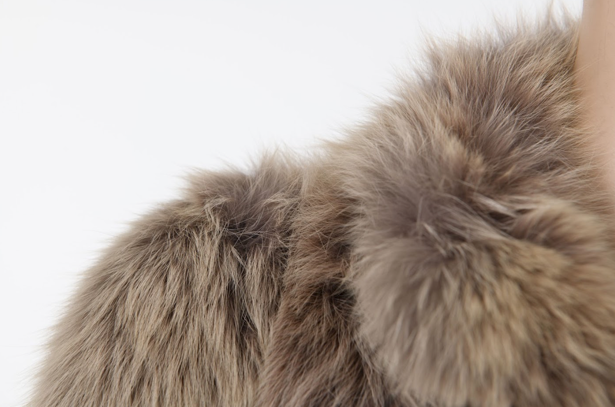 Vintage oversized fur coat with natural tonal variation and luxurious texture