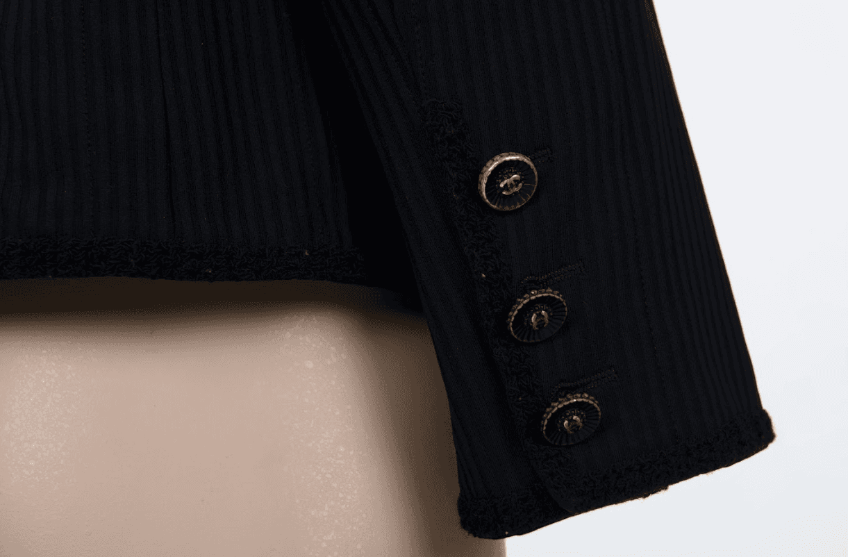 Black Chanel jacket with round neckline and timeless design Mezzanotte Madrid