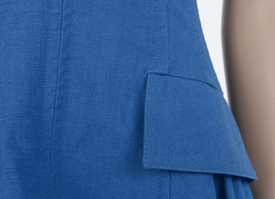 Contemporary halter dress in structured cotton with clean modern silhouette Mezzanotte Madrid