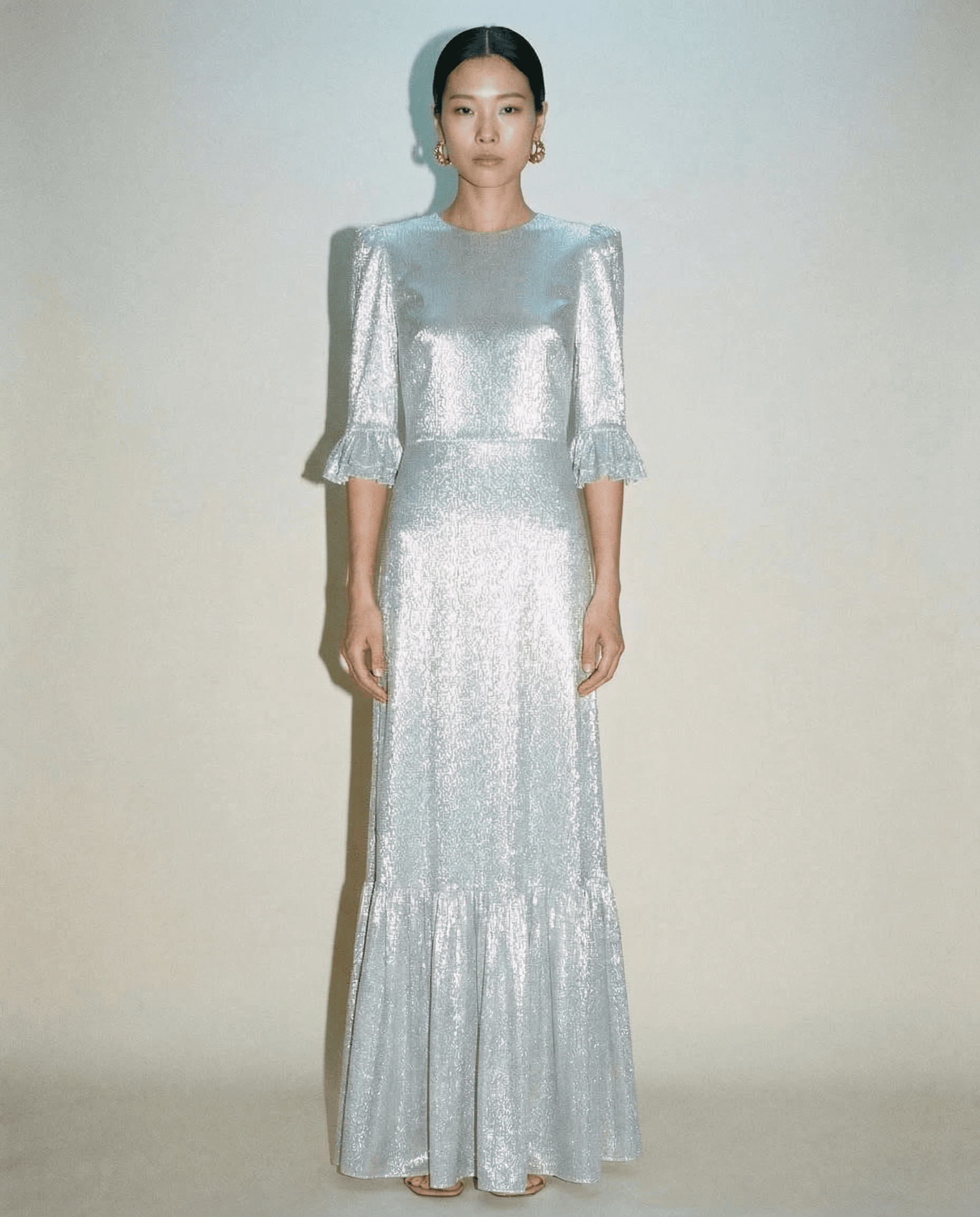 The Vampire’s Wife Silver Falconetti metallic lamé dress with puff sleeves and ruffle hem Mezzanotte Madrid