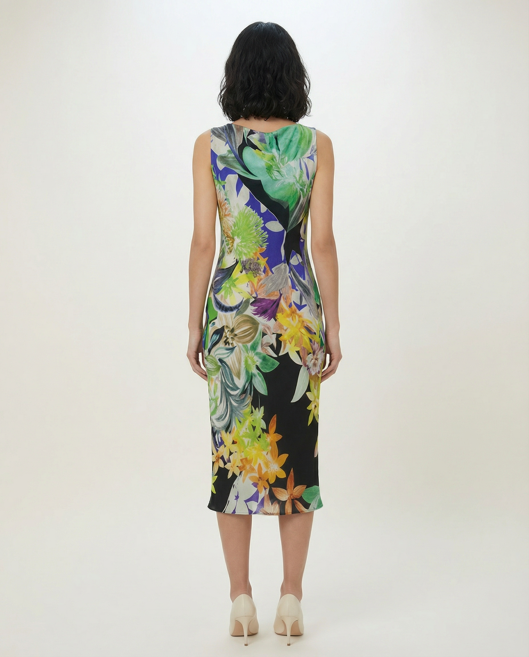 Vintage Cassani dress with fluid shape and vibrant botanical pattern luxury fashion from the back