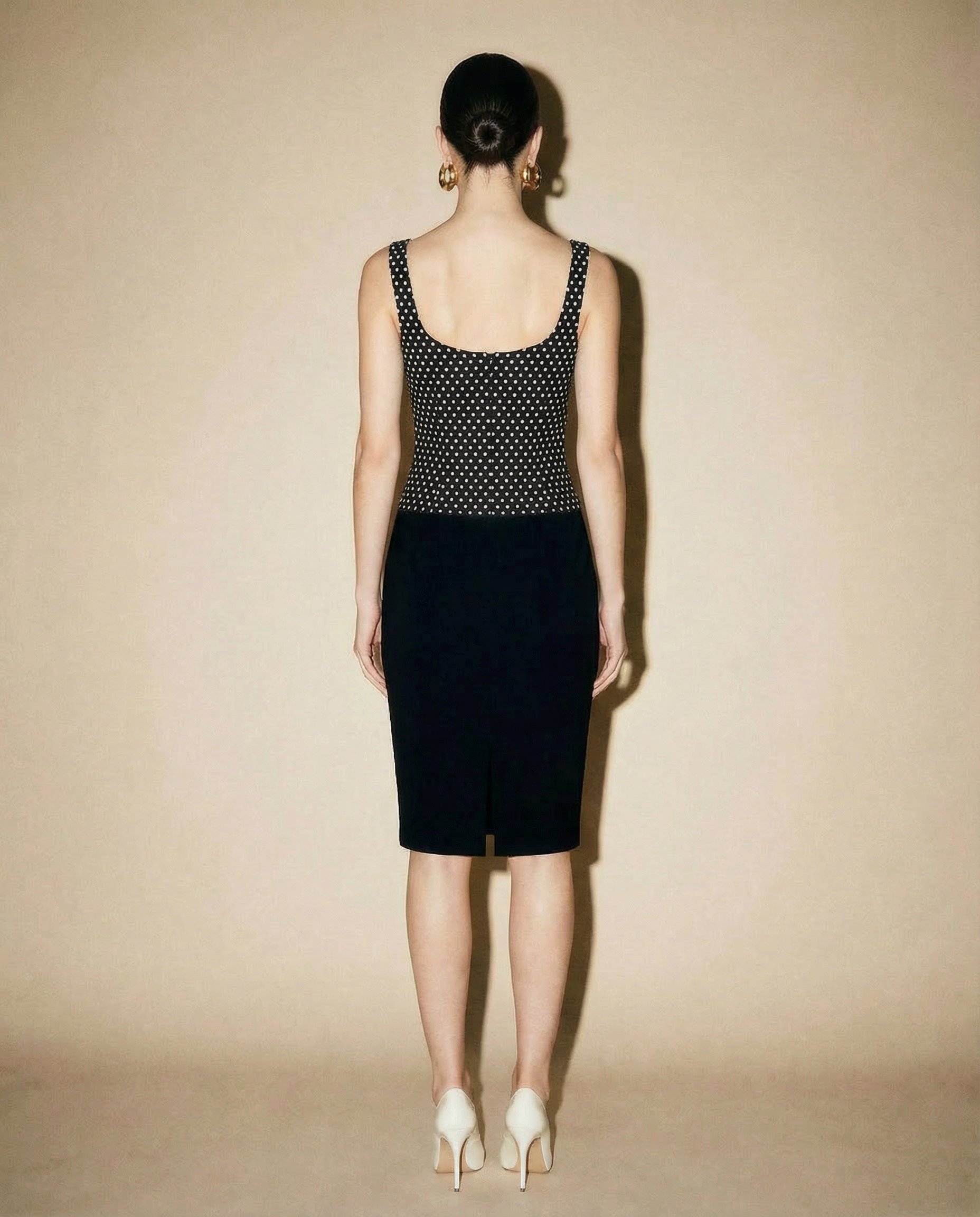 Vintage McQueen evening dress with polka dot bodice and refined two-tone design