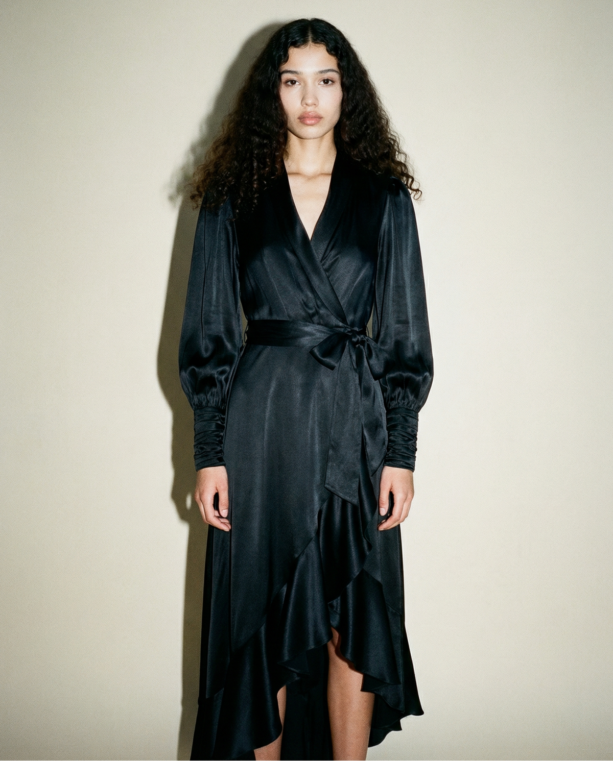 Zimmermann silk wrap midi dress in black with asymmetrical ruffle hem and tie waist Mezzanotte Madrid