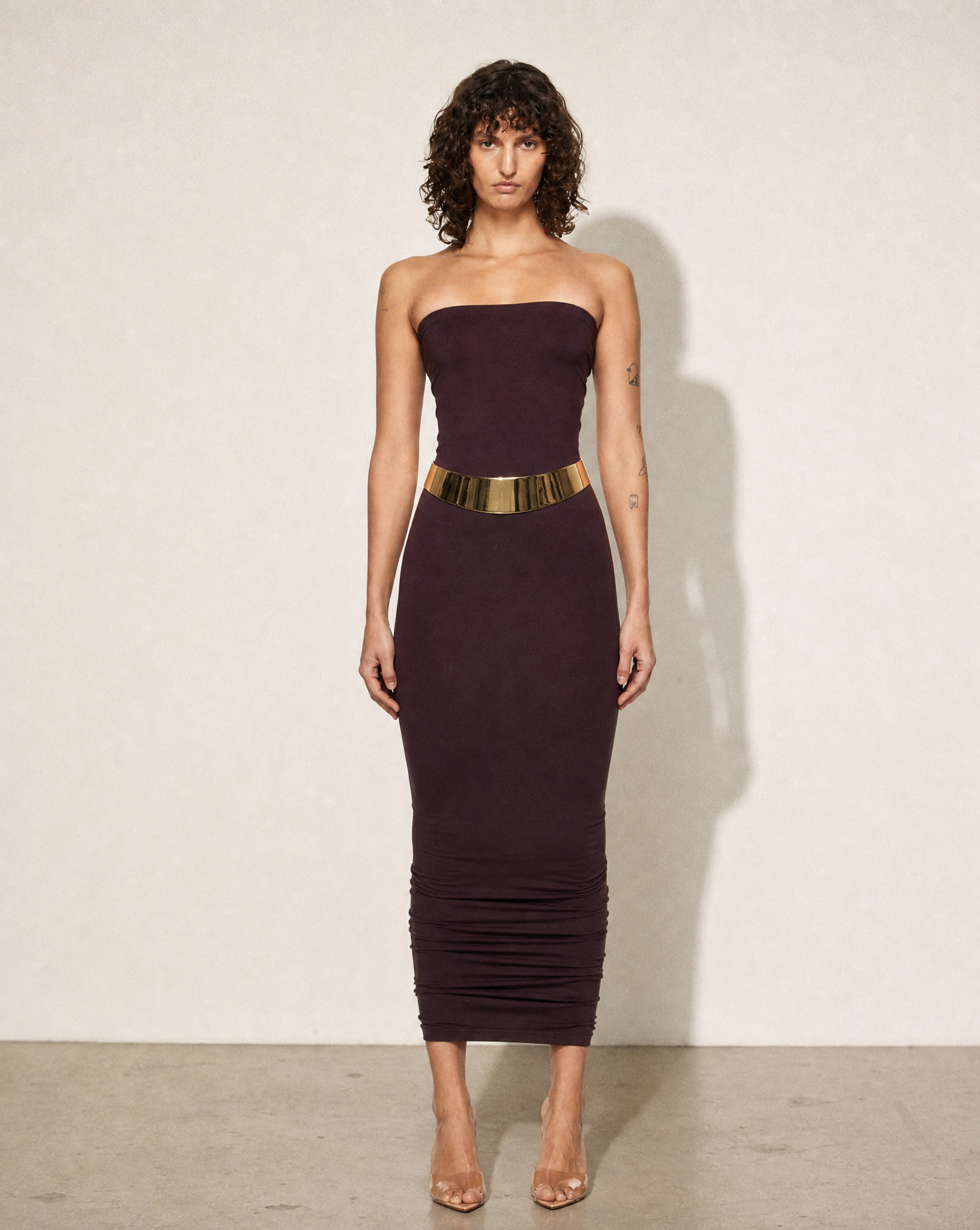 Archival Gucci by Tom Ford wide polished gold metal waist belt from the late 1990s, available at Mezzanotte Madrid.