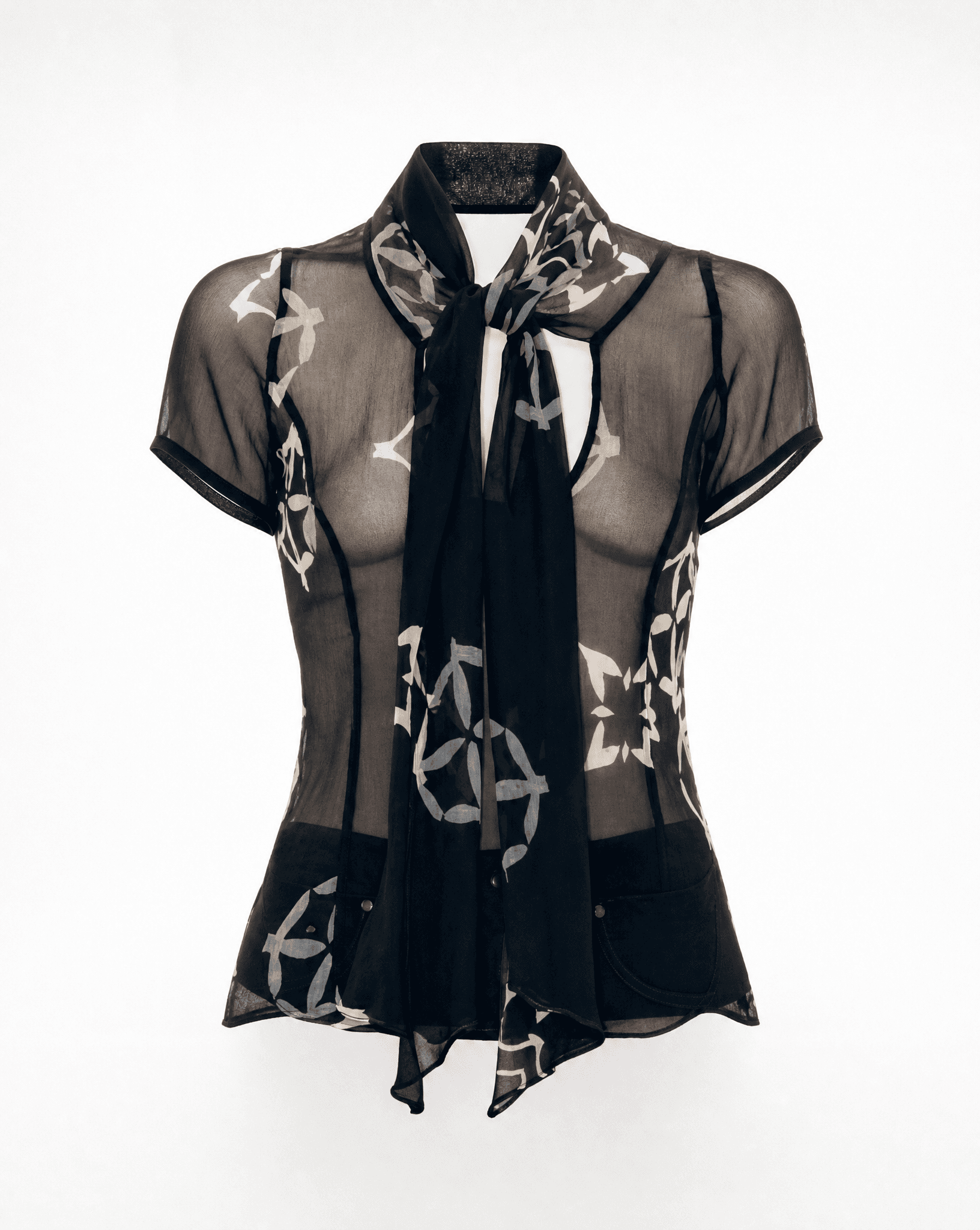 Back view of the vintage Armani Collezioni sheer silk chiffon blouse showcasing the semi-transparent construction and abstract floral print.