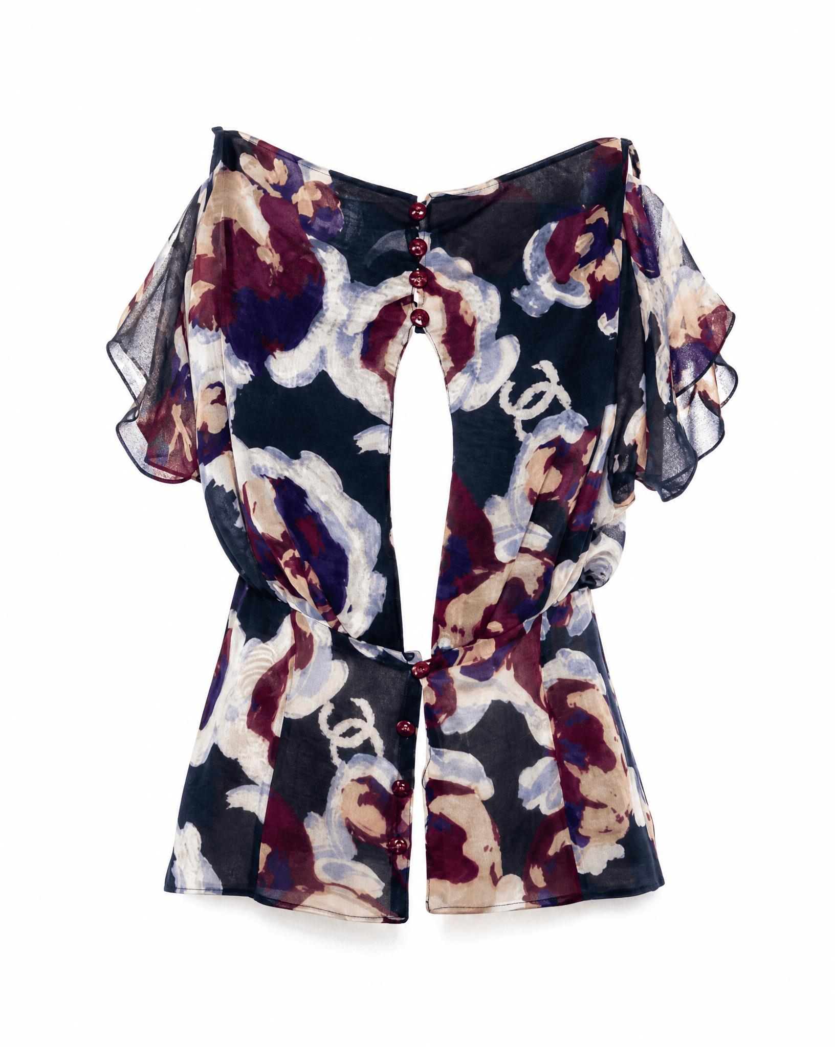 Detail of the keyhole neckline, decorative buttons and abstract floral CC print on a vintage Chanel silk chiffon blouse.