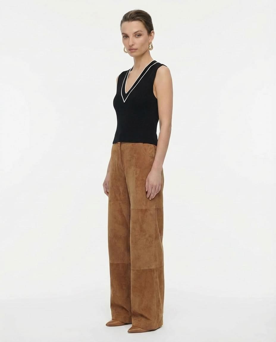 FRAME black sleeveless knit top with contrast white V-neck trim Mezzanotte Madrid