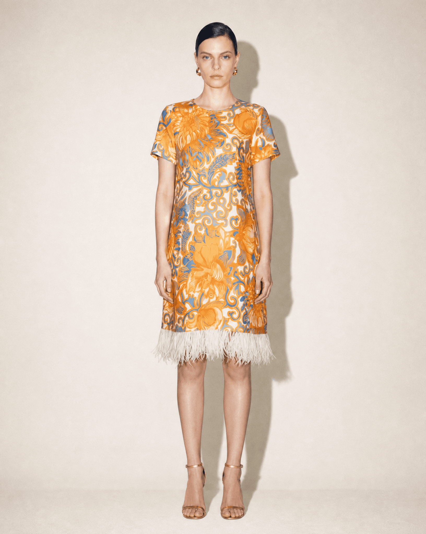 La DoubleJ floral print silk shift dress with ostrich feather trim, available for purchase and luxury rental across Europe from Mezzanotte.