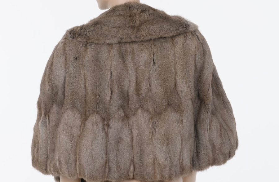 Back view of vintage mink fur bolero jacket in taupe with plush texture and cropped silhouette Mezzanotte Madrid