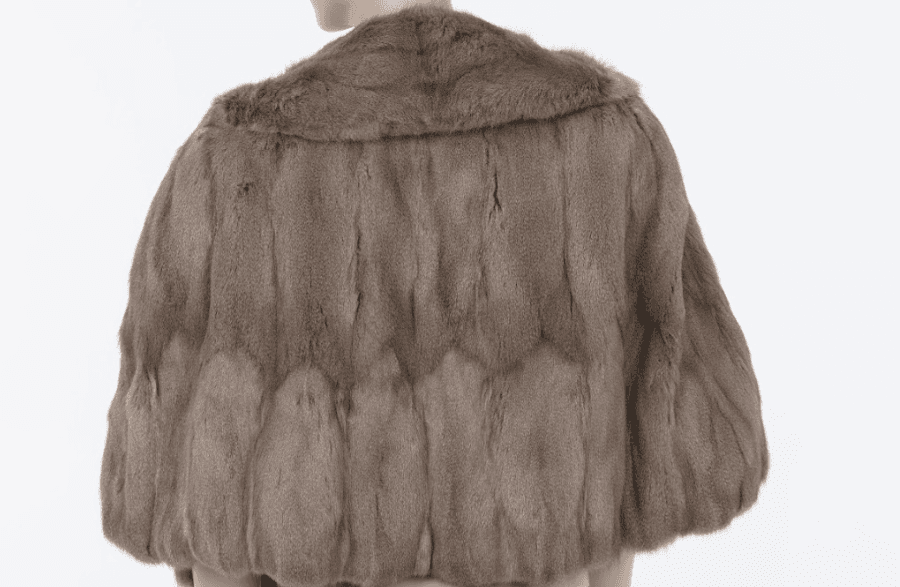 Back view of vintage mink fur bolero jacket in taupe with plush texture and cropped silhouette Mezzanotte Madrid