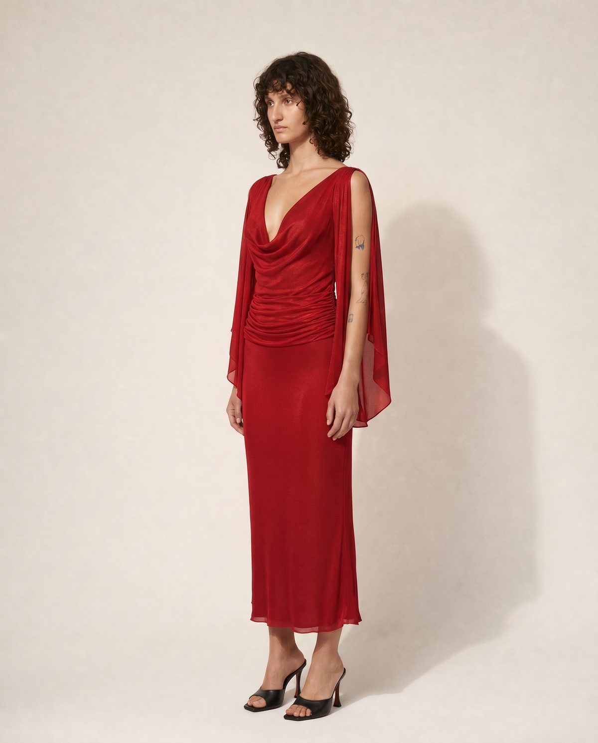 Vintage Valentino Garavani silk chiffon evening gown featuring a draped cowl neckline. Buy across Europe at Mezzanotte.