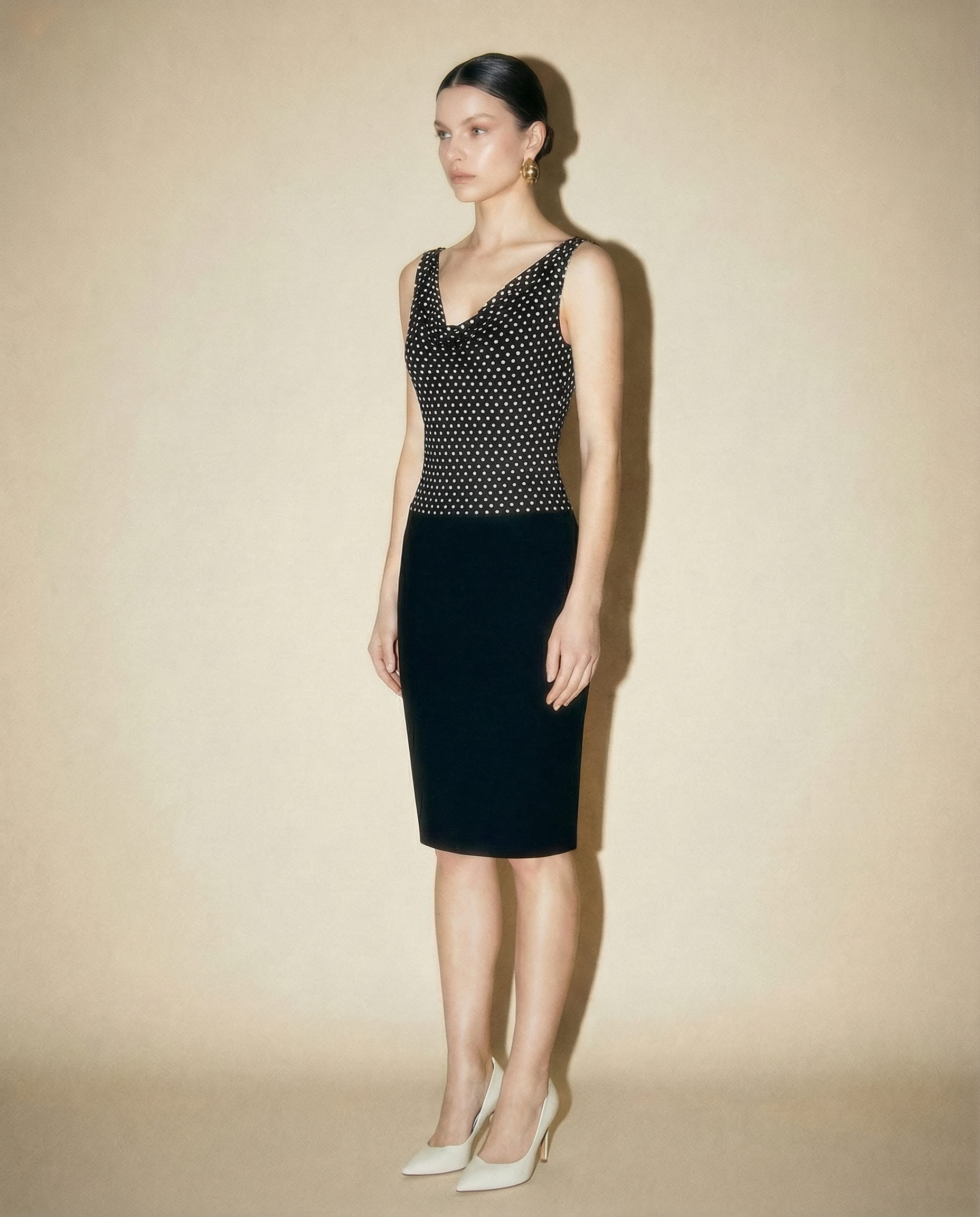 Alexander McQueen dress with structured silhouette and classic polka dot pattern Mezzanotte
