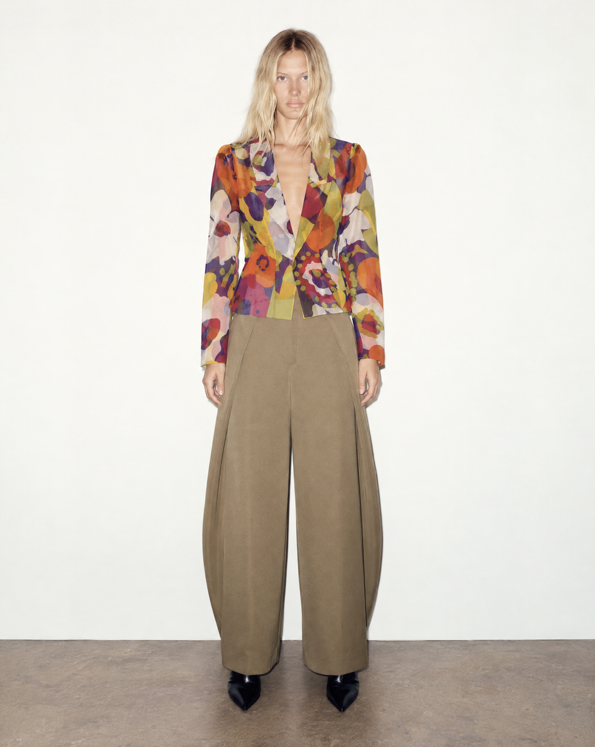 Authentic vintage Chanel Spring Summer 2002 Karl Lagerfeld multicolor silk chiffon floral blouse worn over an orange top Mezzanotte Vintage Archival

