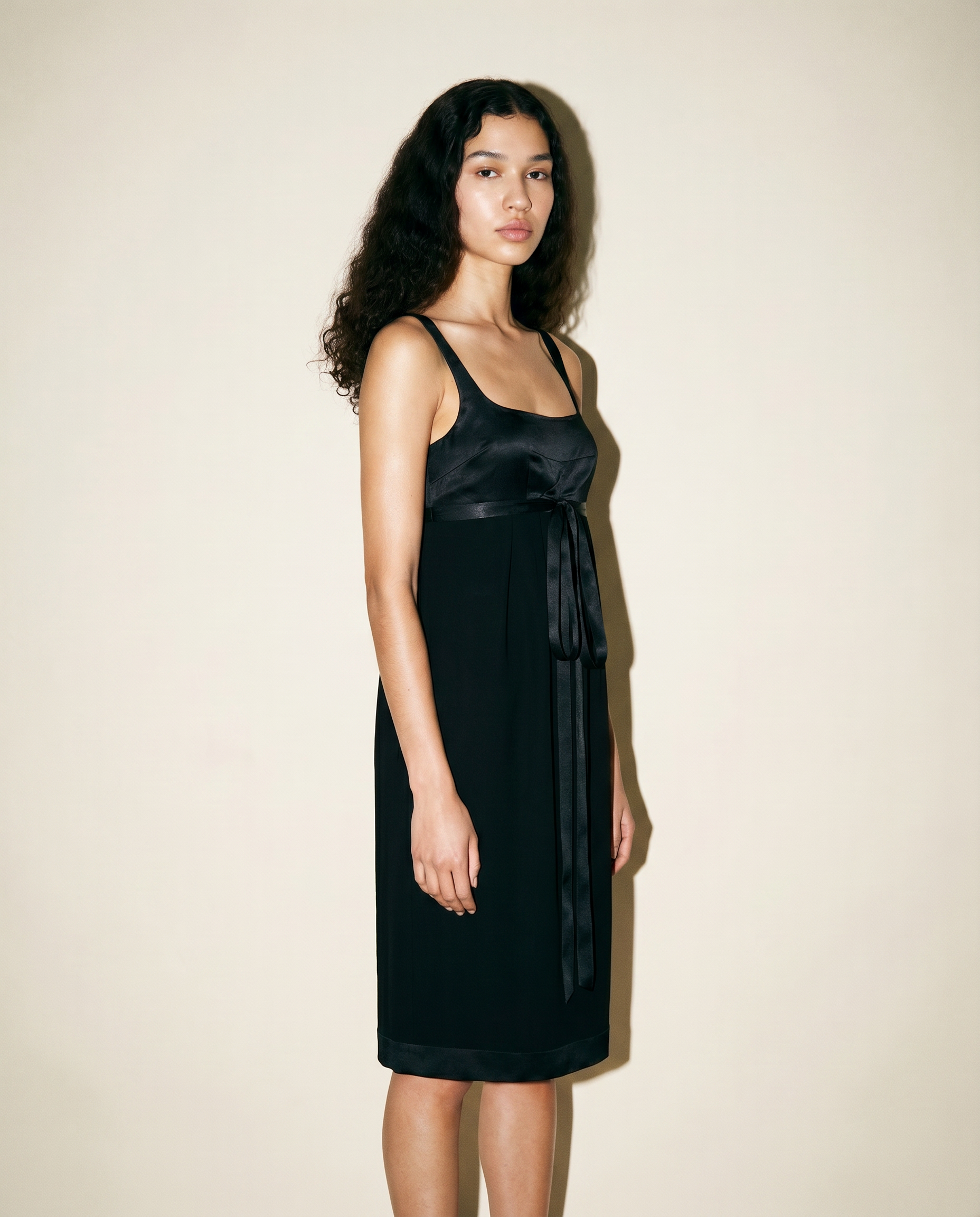 Full-length view of the archival Chanel Little Black Dress showcasing its timeless knee-length proportions and Karl Lagerfeld's refined tailoring.
