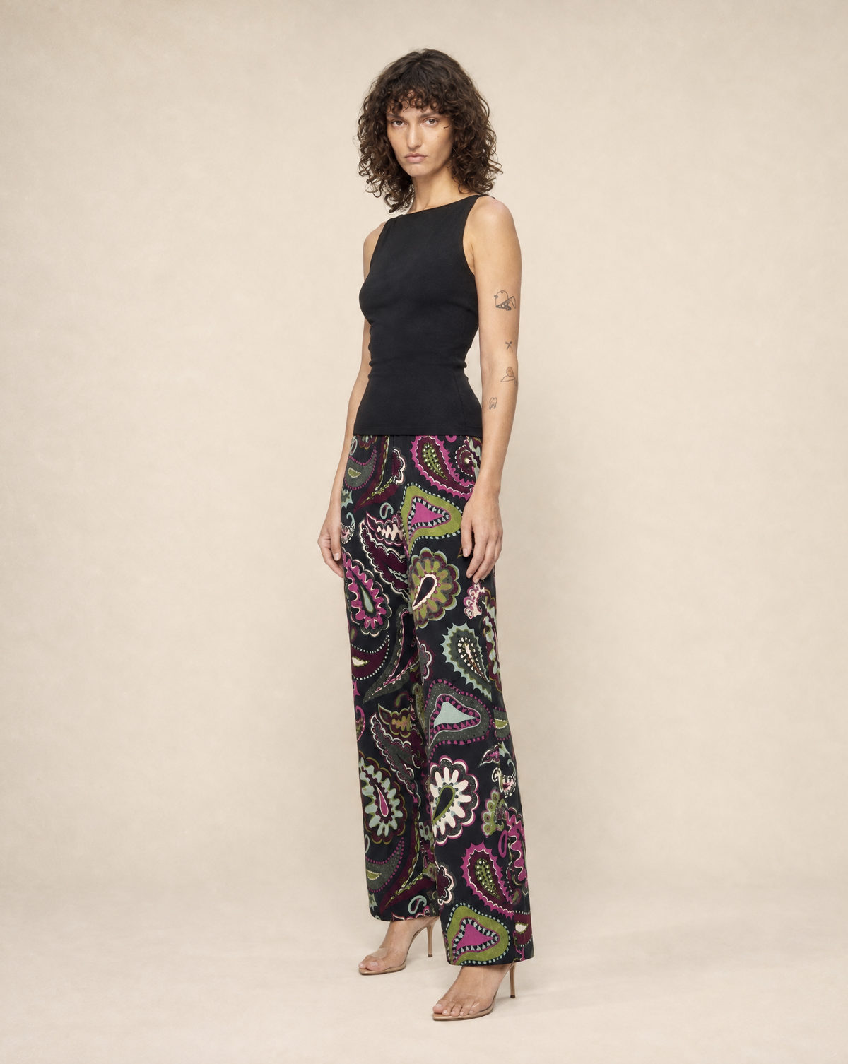 Close-up of the kaleidoscopic paisley print on these 1960s Emilio Pucci trousers. A collectible piece for vintage Pucci collectors and lovers of Italian fashion.