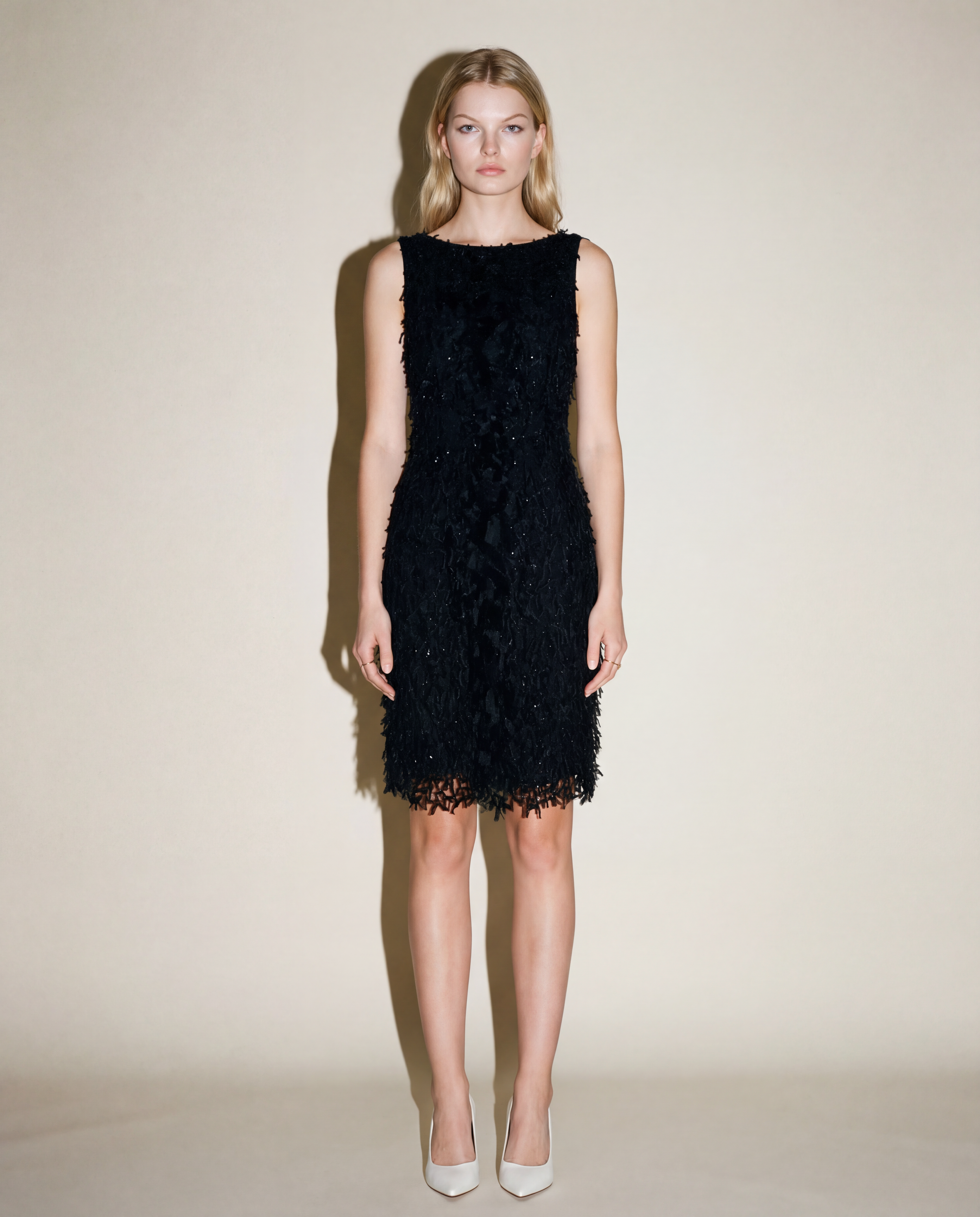Oscar de la Renta black textured midi dress with appliqué and subtle sequin detailing Mezzanotte Madrid
