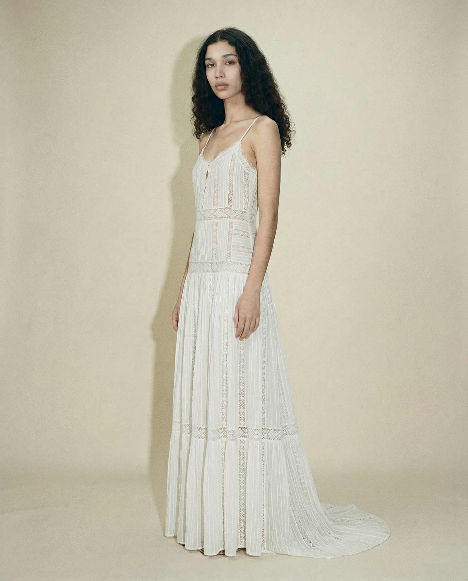Ivory Cavalli runway gown with lace panels and flowing tiered skirt