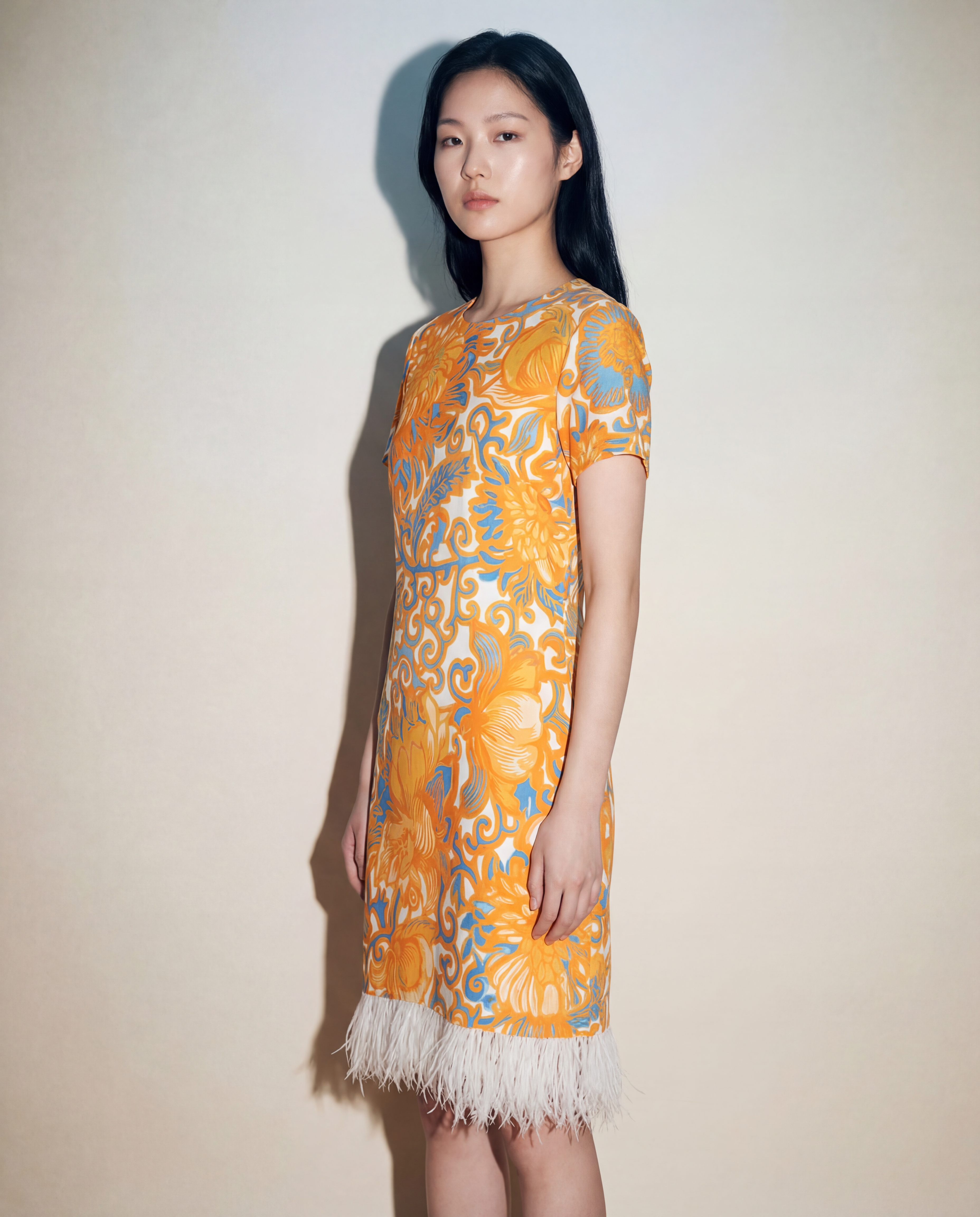 Floral La DoubleJ mini dress with crew neckline, short sleeves and feather hemline