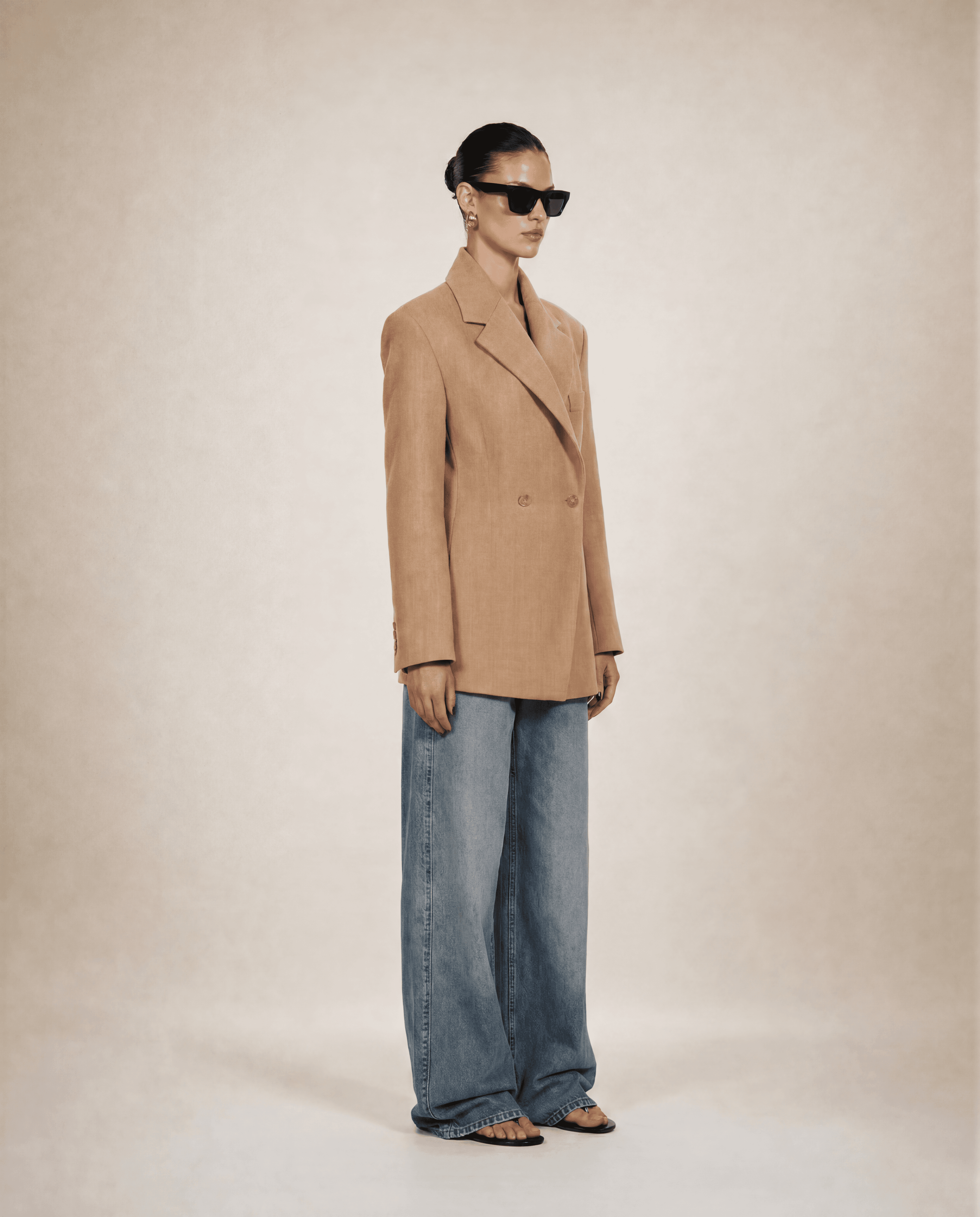 CONTEMPORARY "Nangy" Cinched Hourglass Blazer – Source Unknown.
