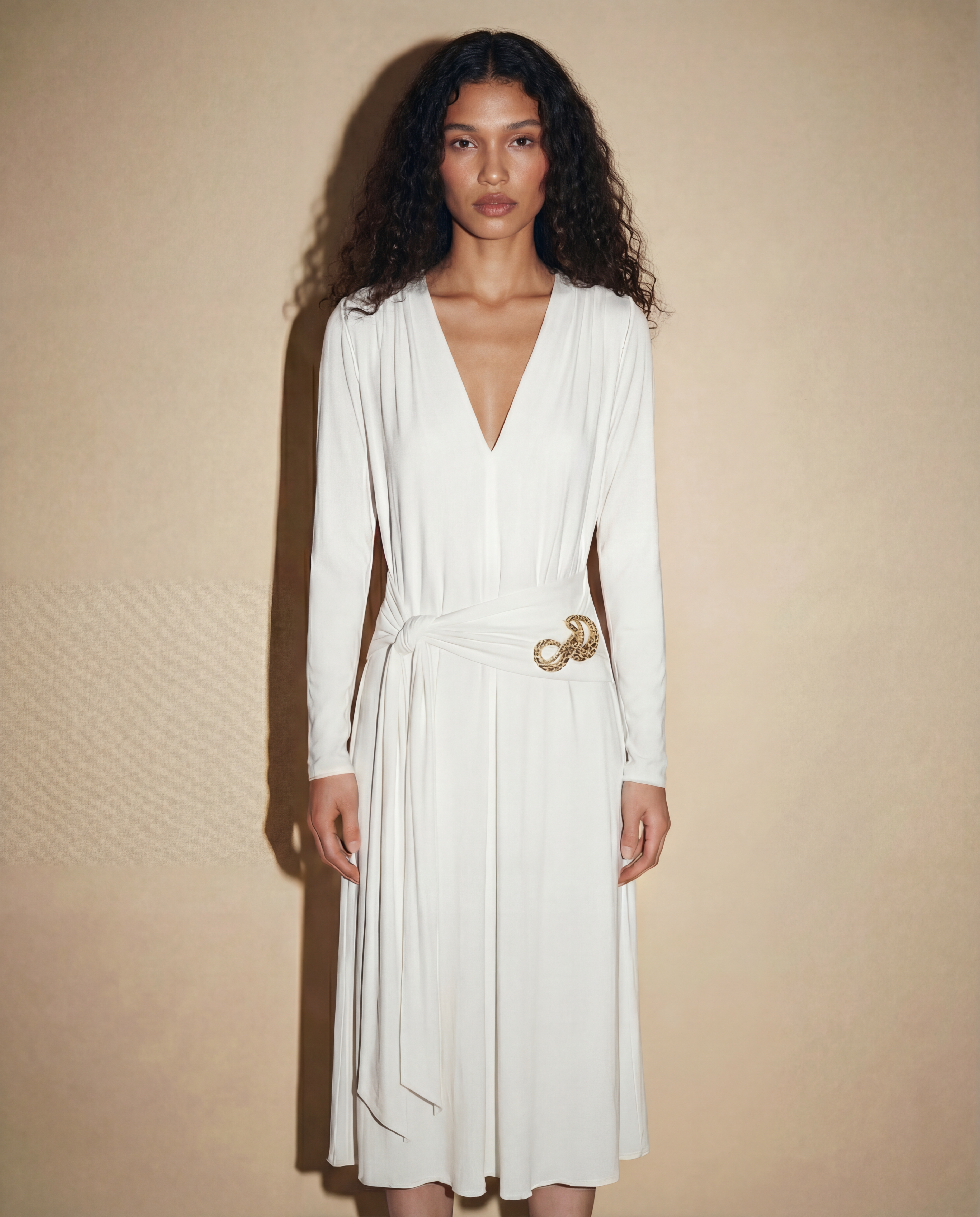 Roberto Cavalli ivory draped midi dress with long sleeves and gold buckle detail | contemporary designer dress Mezzanotte Madrid