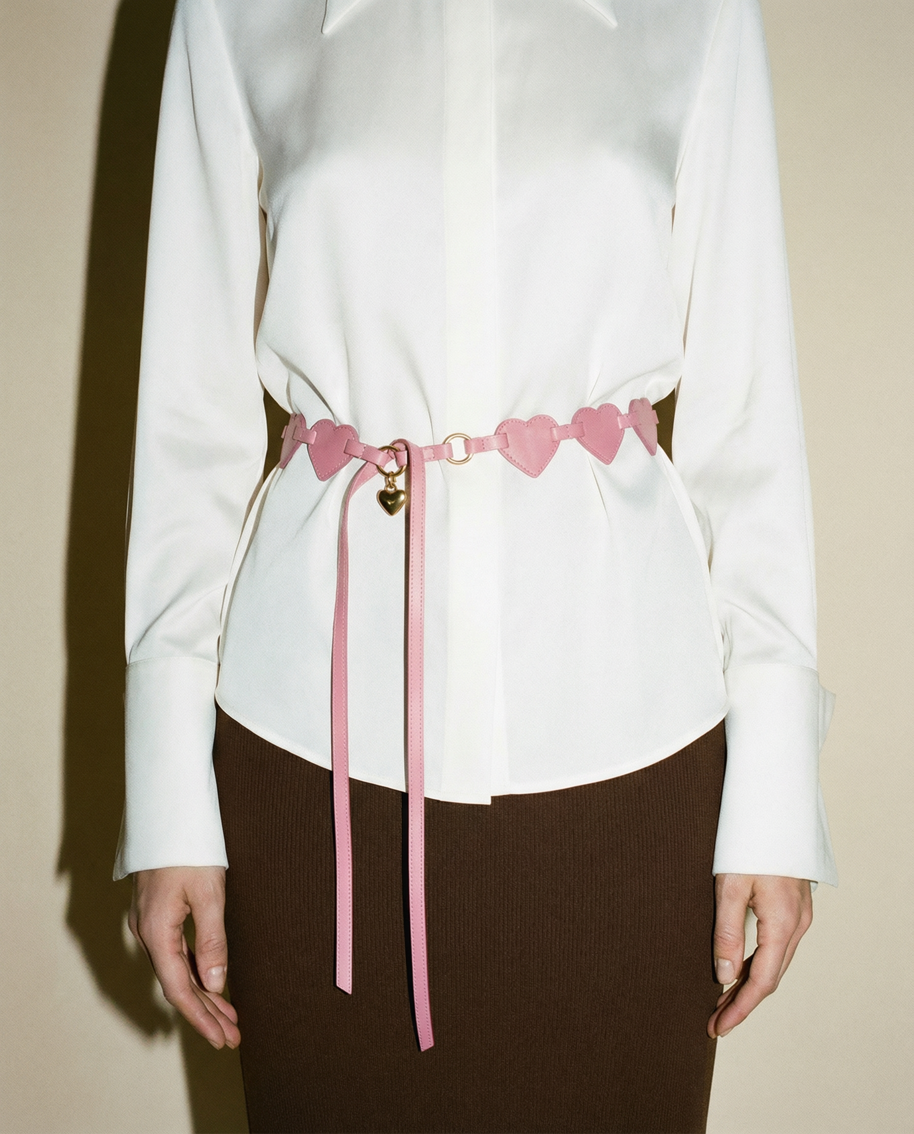 Yves Saint Laurent pink leather heart chain belt with gold hardware and YSL charm Mezzanotte Madrid